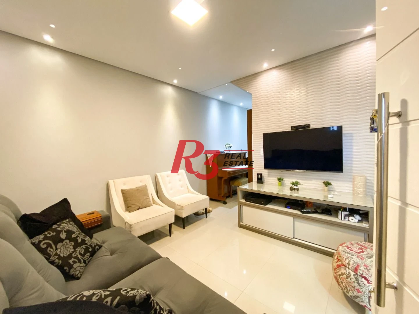 Sobrado com 3 dormitórios à venda, 130 m² por R$ 980.000 no José Menino - Santos/SP