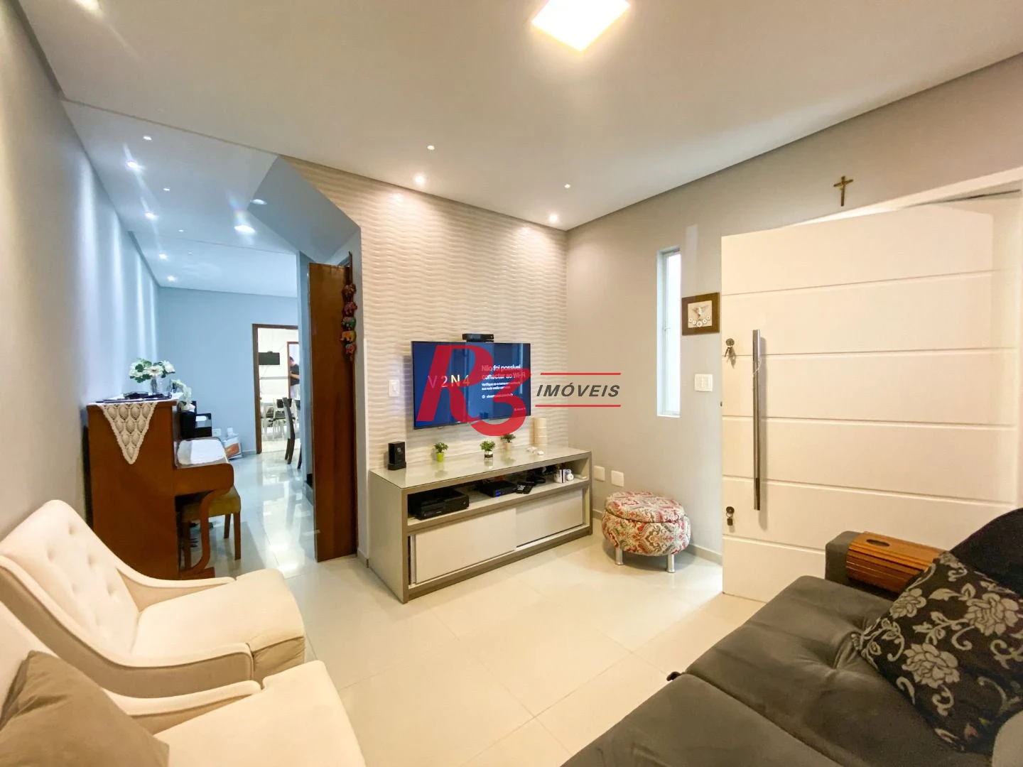 Sobrado com 3 dormitórios à venda, 130 m² por R$ 980.000 no José Menino - Santos/SP