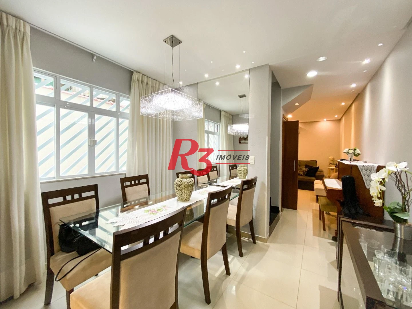 Sobrado com 3 dormitórios à venda, 130 m² por R$ 980.000 no José Menino - Santos/SP