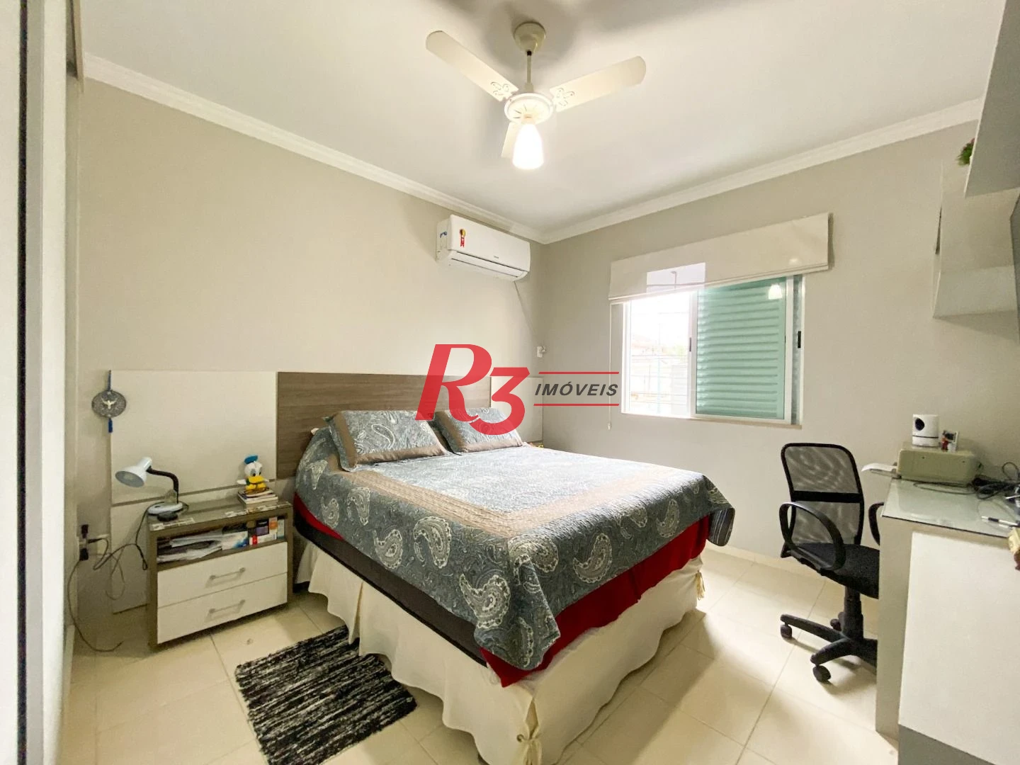 Sobrado com 3 dormitórios à venda, 130 m² por R$ 980.000 no José Menino - Santos/SP