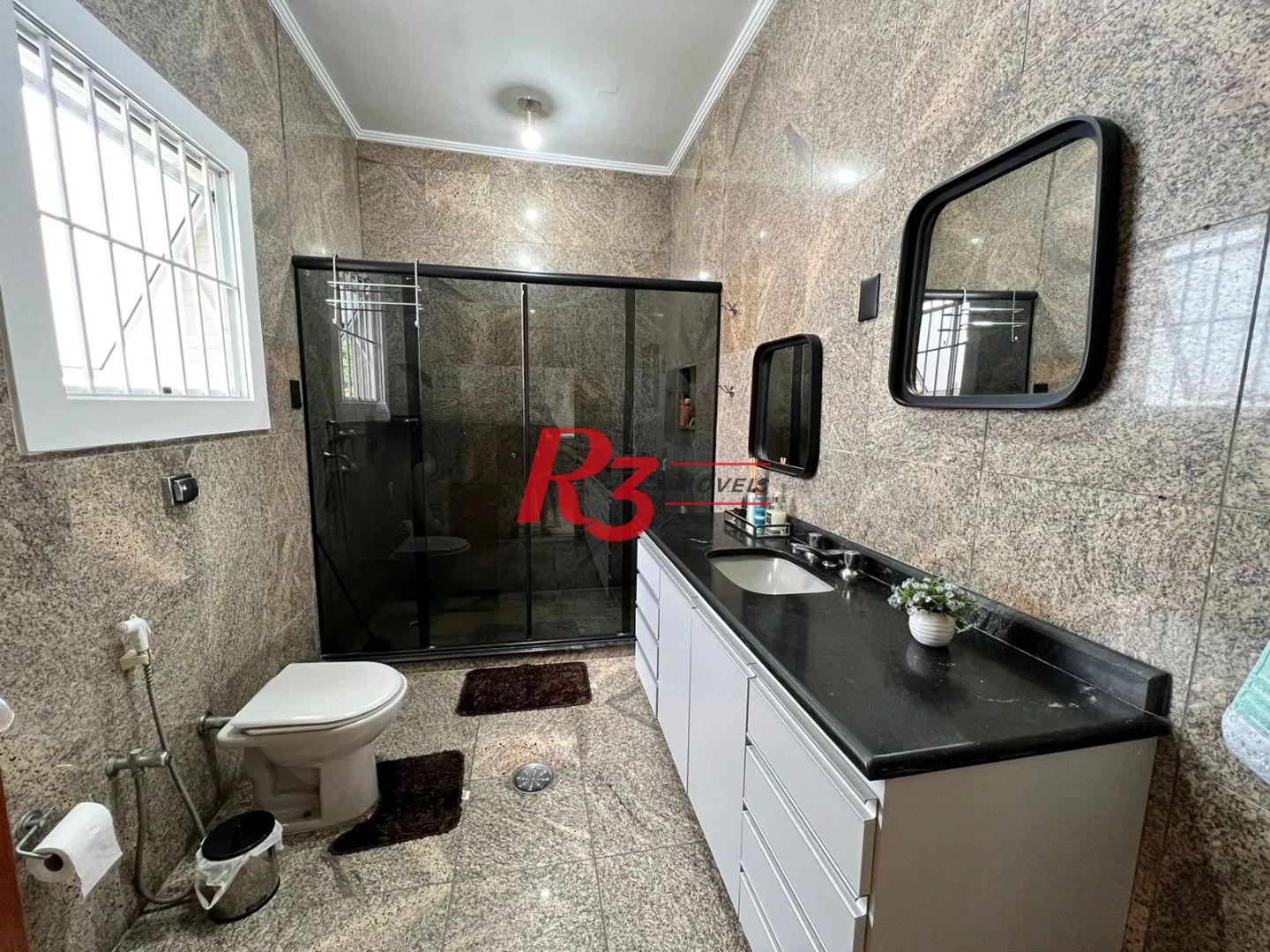 Sobrado com 3 dormitórios à venda, 280 m² por R$ 1.850.000,00 - Embaré - Santos/SP