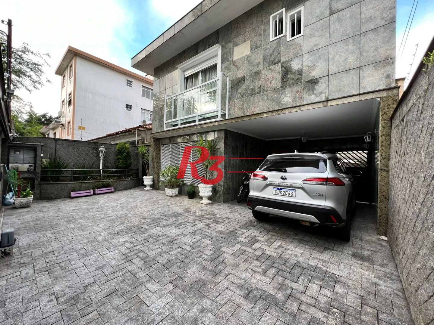 Sobrado com 3 dormitórios à venda, 280 m² por R$ 1.850.000,00 - Embaré - Santos/SP