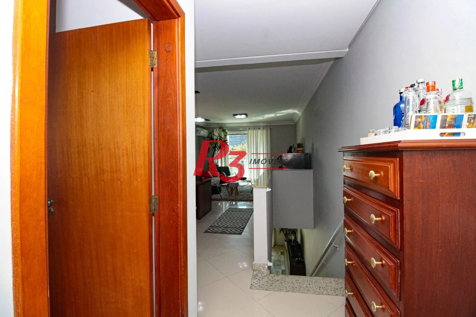 Sobrado com 4 dormitórios à venda, 227 m² por R$ 1.700.000,00 - Boqueirão - Santos/SP