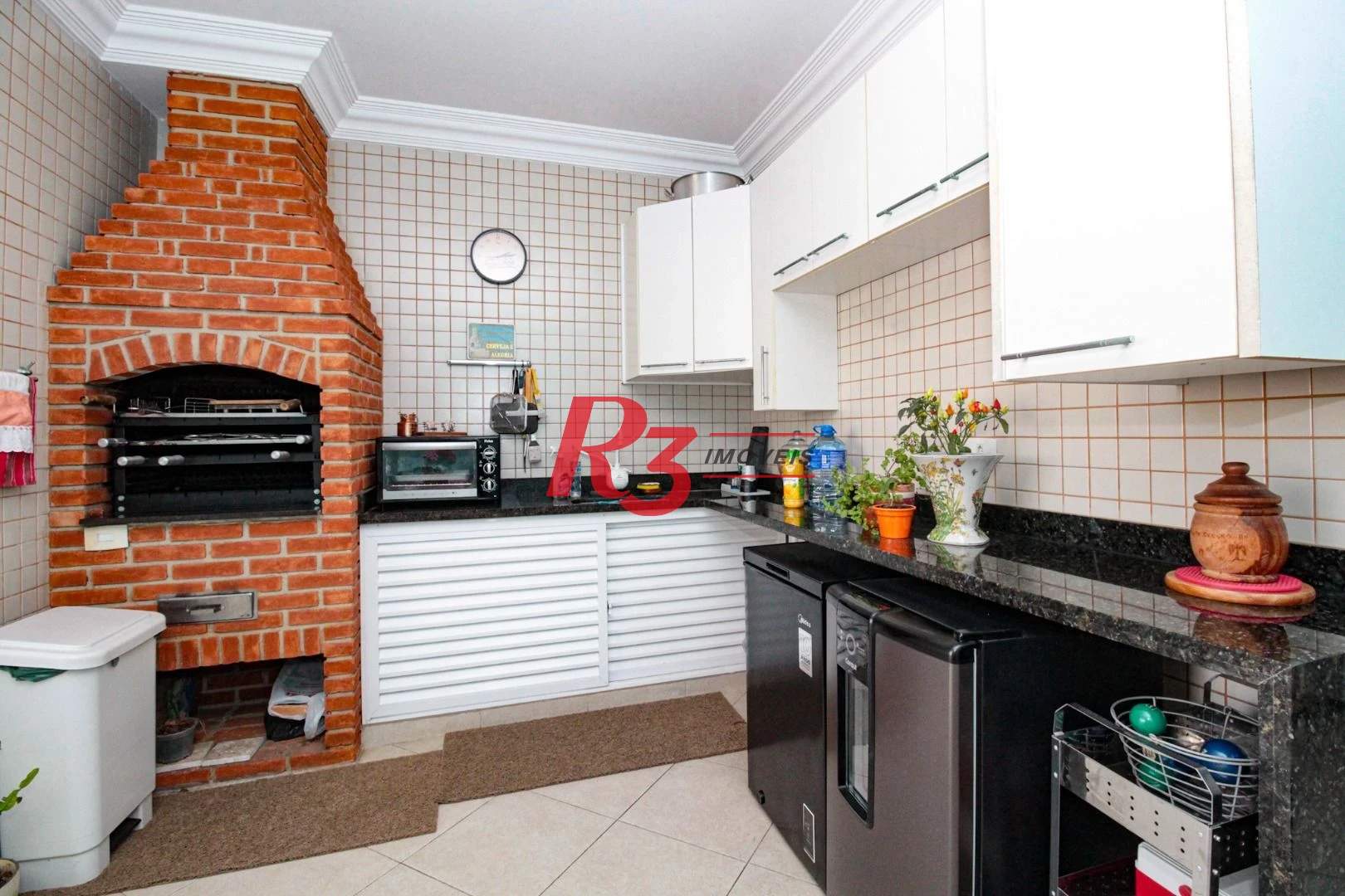 Sobrado com 4 dormitórios à venda, 227 m² por R$ 1.700.000,00 - Boqueirão - Santos/SP