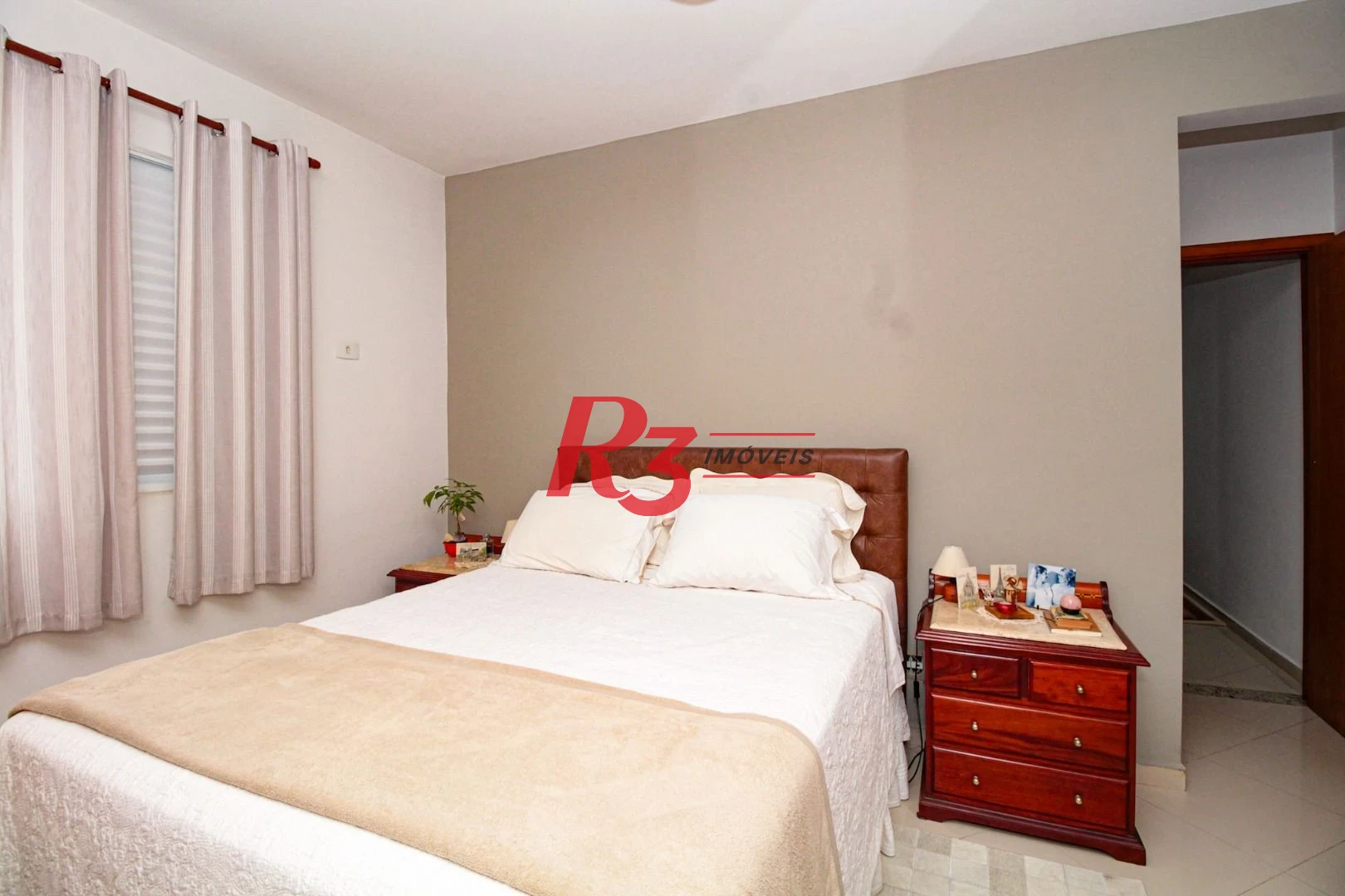 Sobrado com 4 dormitórios à venda, 227 m² por R$ 1.700.000,00 - Boqueirão - Santos/SP