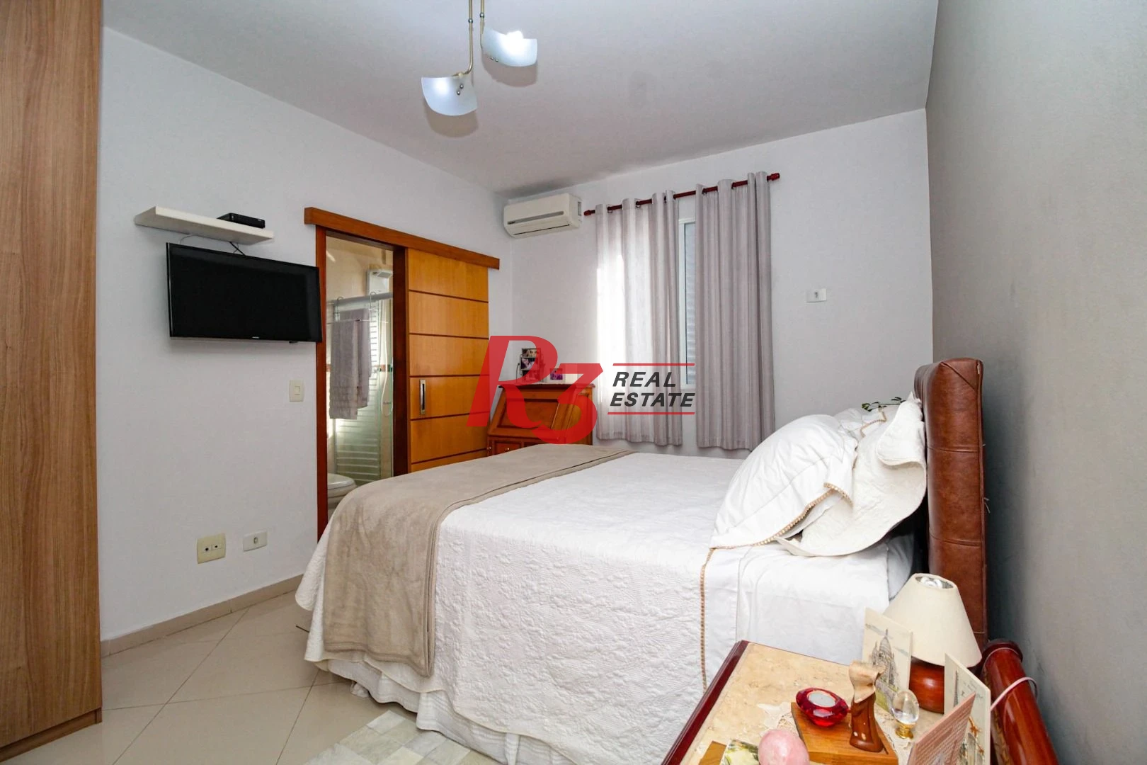 Sobrado com 4 dormitórios à venda, 227 m² por R$ 1.830.000,00 - Boqueirão - Santos/SP