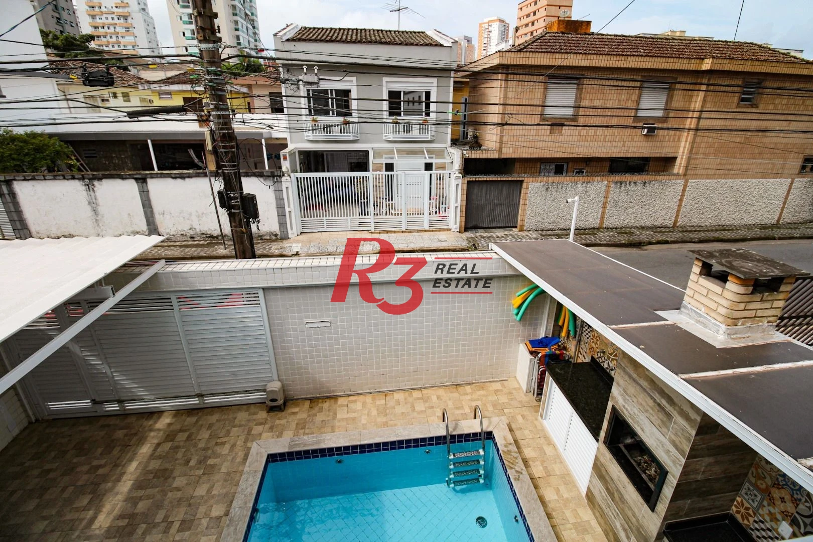 Sobrado com 3 dormitórios à venda, 150 m² por R$ 1.650.000,00 - Ponta da Praia - Santos/SP