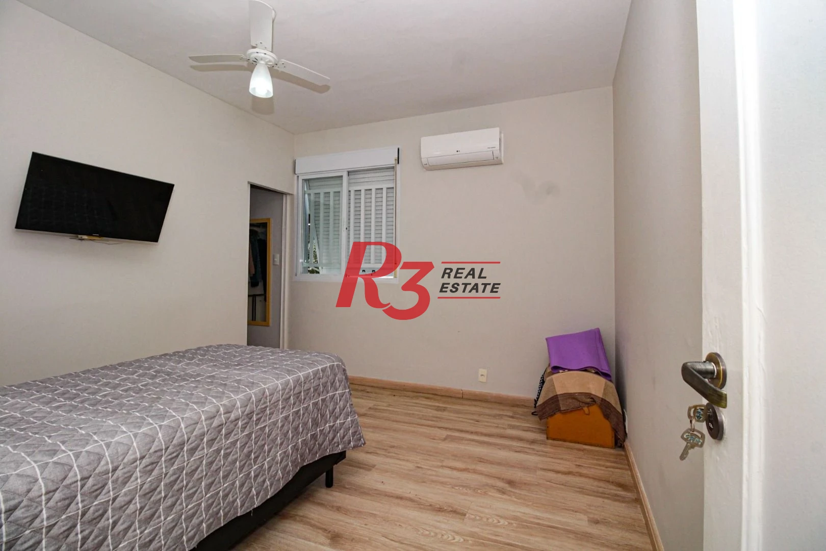 Sobrado com 3 dormitórios à venda, 150 m² por R$ 1.650.000,00 - Ponta da Praia - Santos/SP