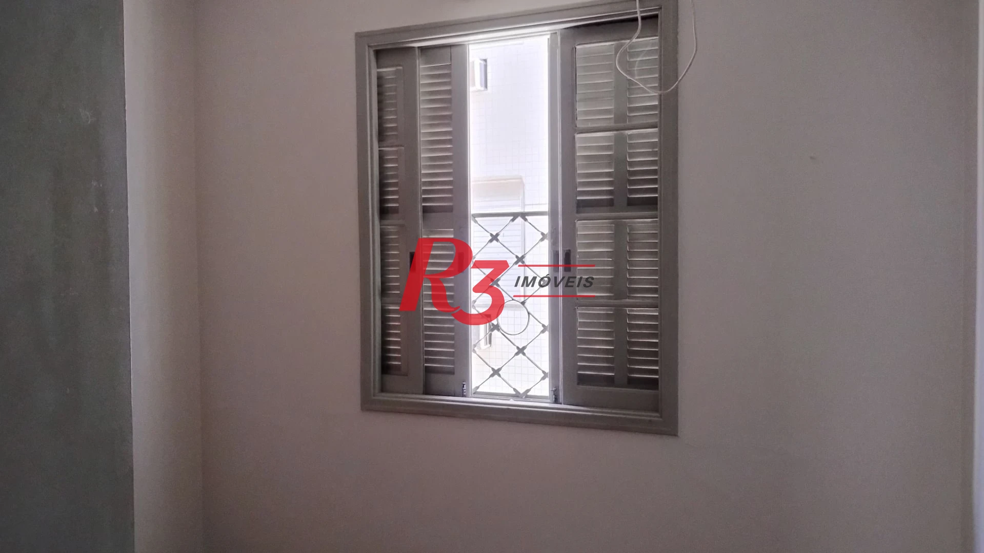Apartamento com 2 dormitórios à venda, 76 m² por R$ 352.000,00 - Gonzaga - Santos/SP
