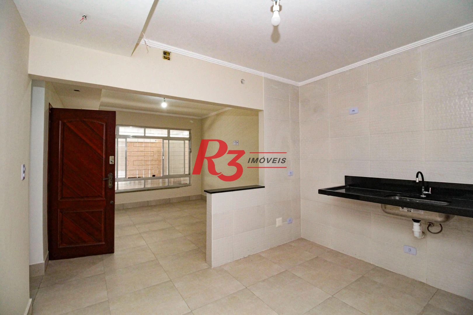 Casa com 3 dormitórios à venda, 110 m² por R$ 870.000,00 - Encruzilhada - Santos/SP