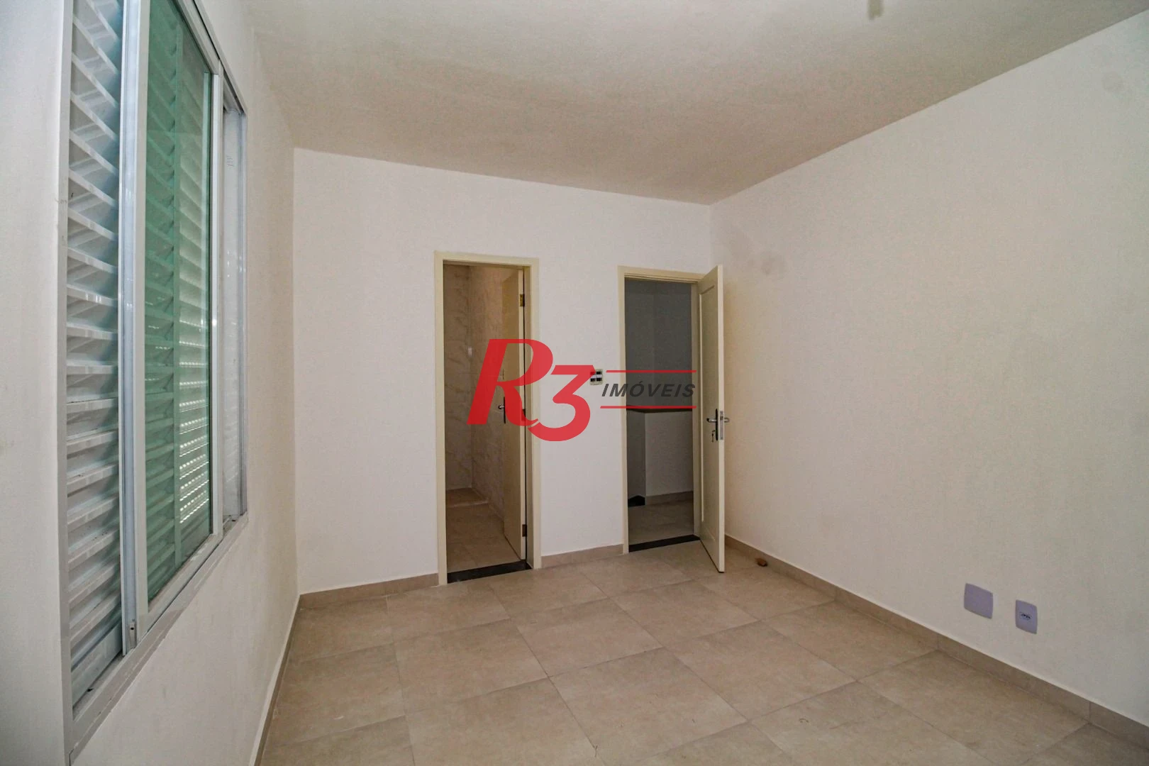 Casa com 3 dormitórios à venda, 110 m² por R$ 870.000,00 - Encruzilhada - Santos/SP