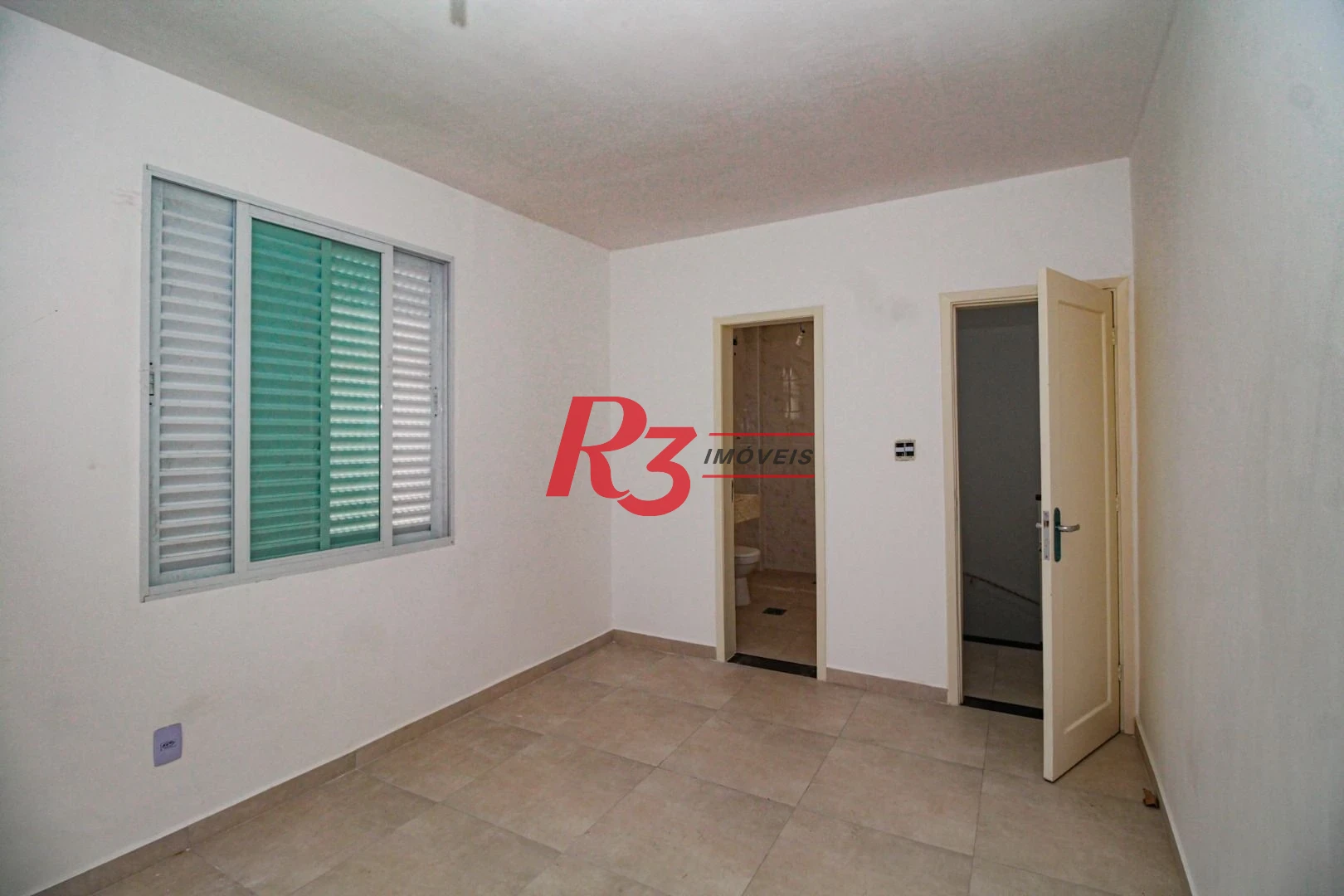Casa com 3 dormitórios à venda, 110 m² por R$ 870.000,00 - Encruzilhada - Santos/SP
