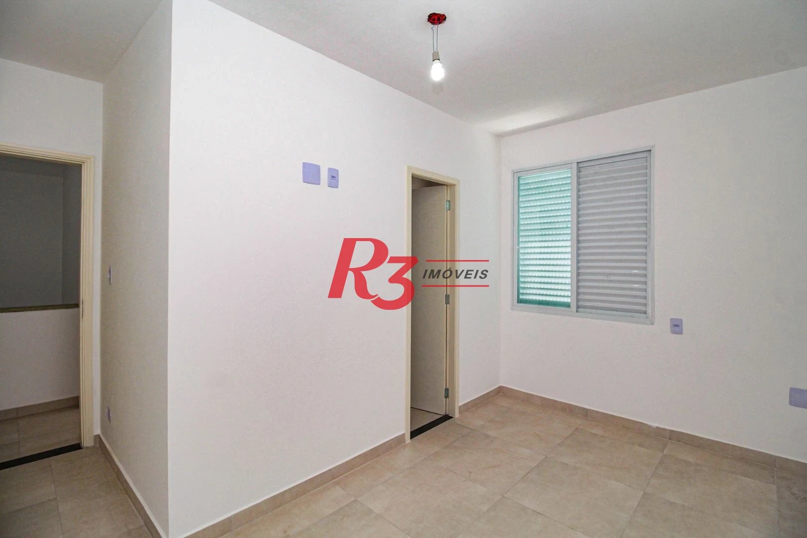Casa com 3 dormitórios à venda, 110 m² por R$ 870.000,00 - Encruzilhada - Santos/SP