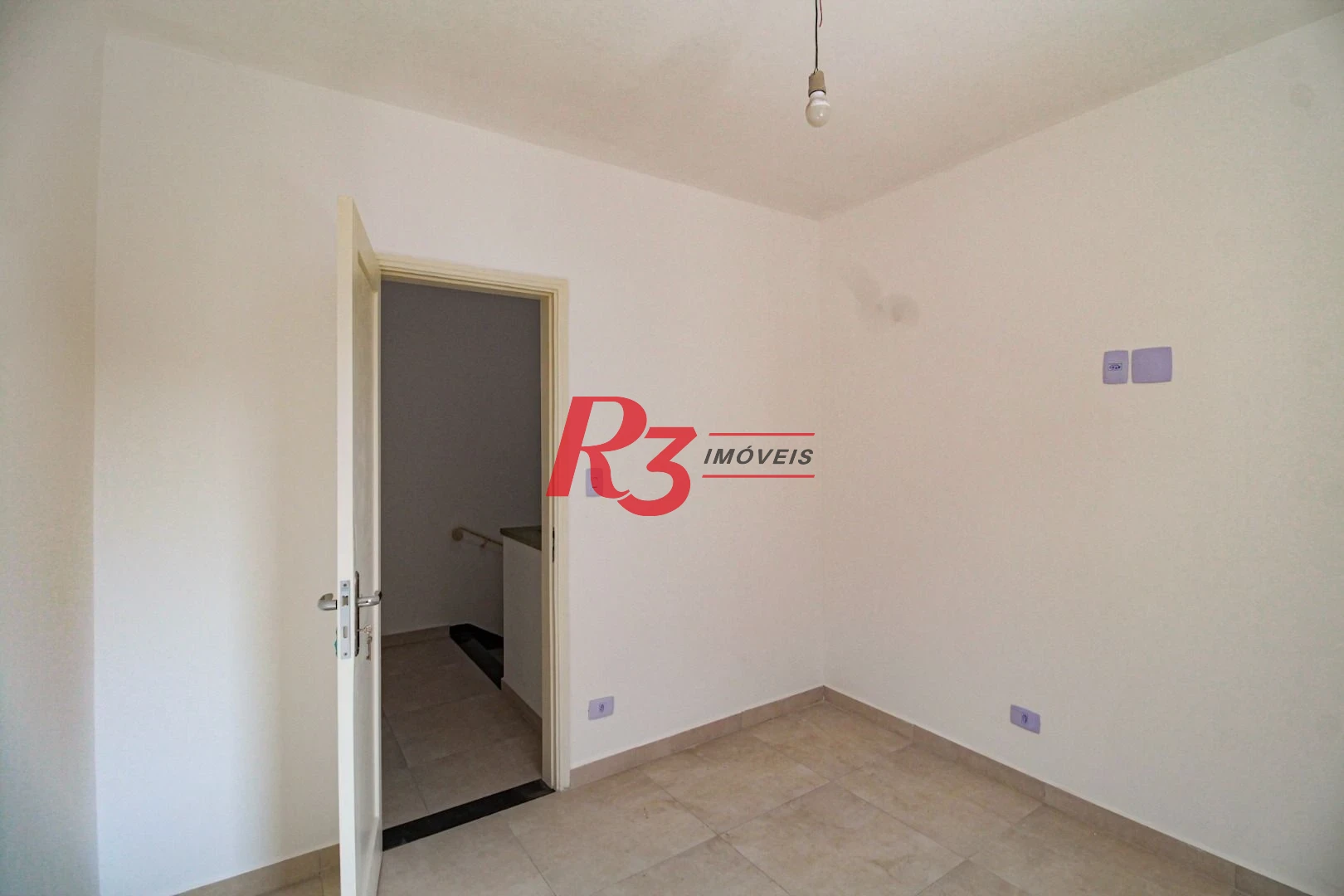 Casa com 3 dormitórios à venda, 110 m² por R$ 870.000,00 - Encruzilhada - Santos/SP