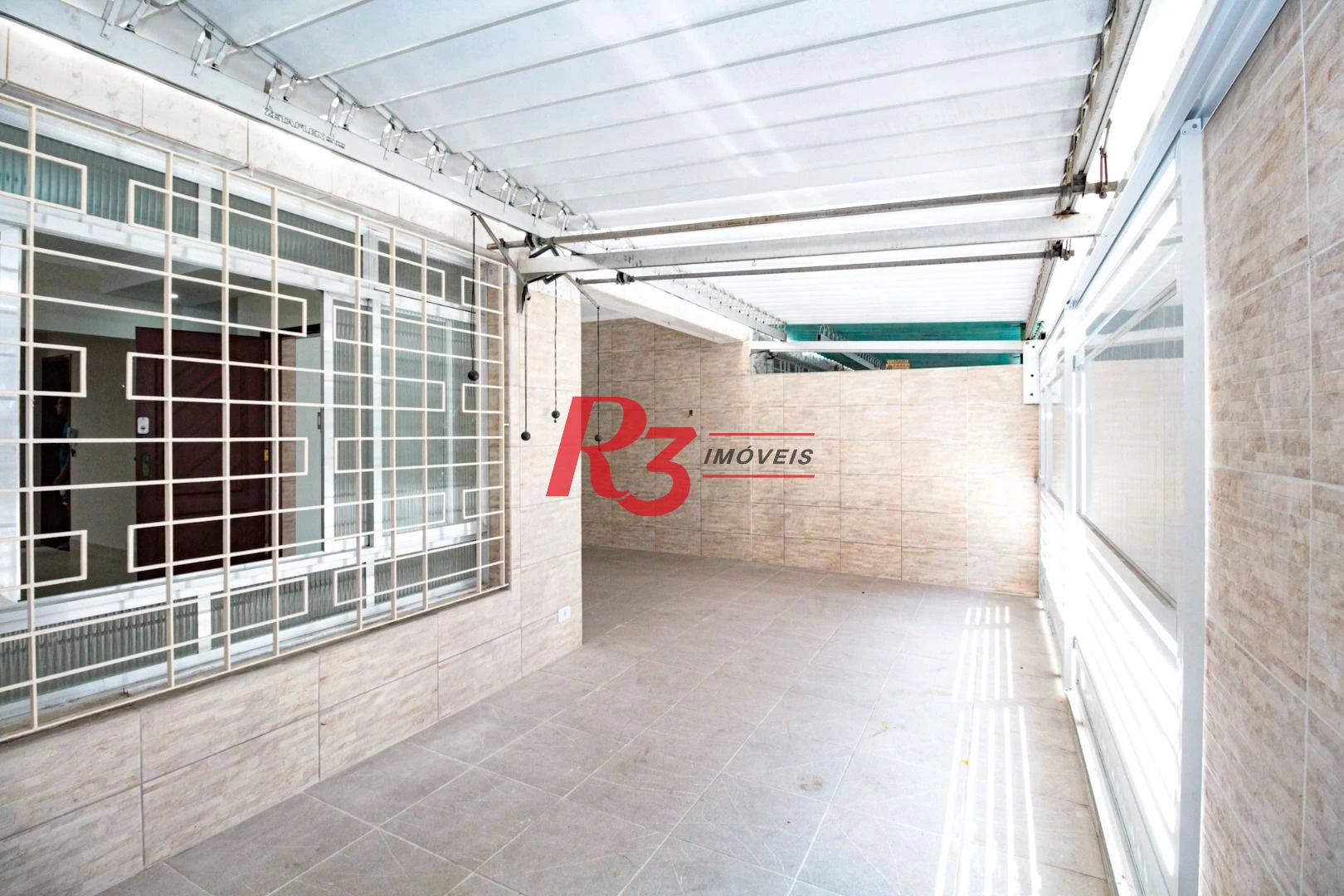 Casa com 3 dormitórios à venda, 110 m² por R$ 870.000,00 - Encruzilhada - Santos/SP