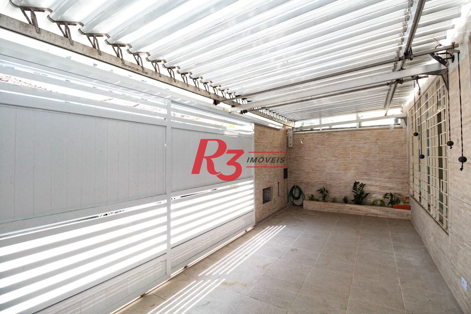 Casa com 3 dormitórios à venda, 110 m² por R$ 870.000,00 - Encruzilhada - Santos/SP