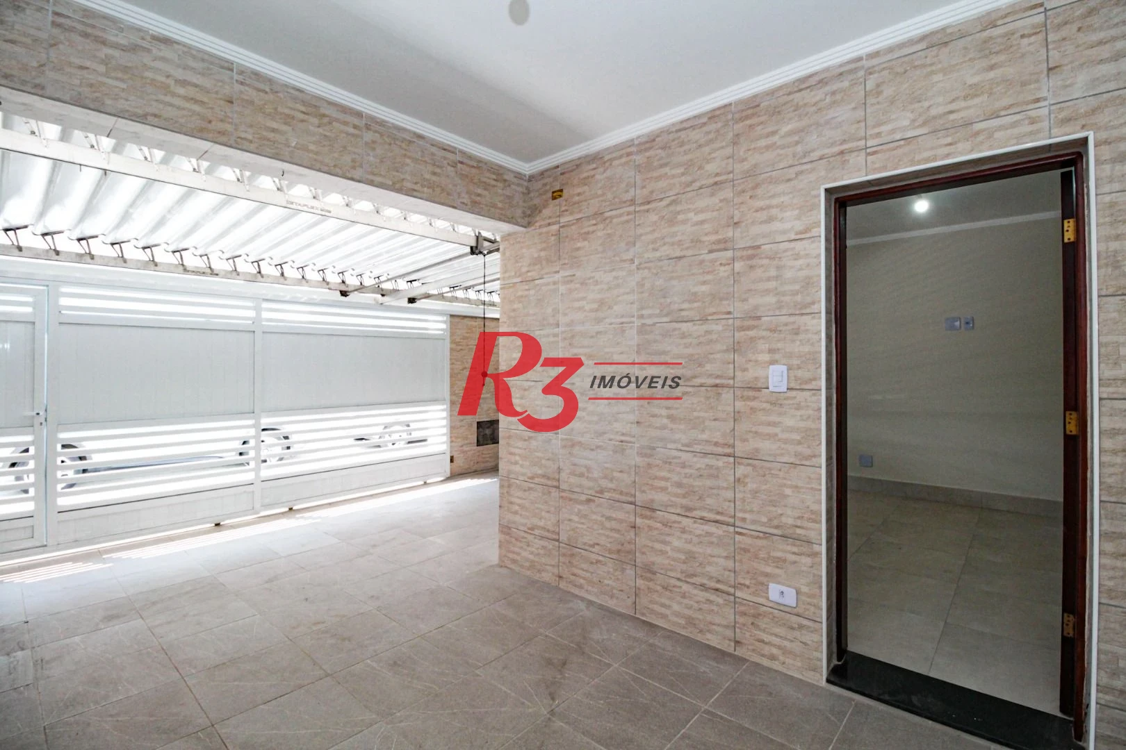 Casa com 3 dormitórios à venda, 110 m² por R$ 870.000,00 - Encruzilhada - Santos/SP