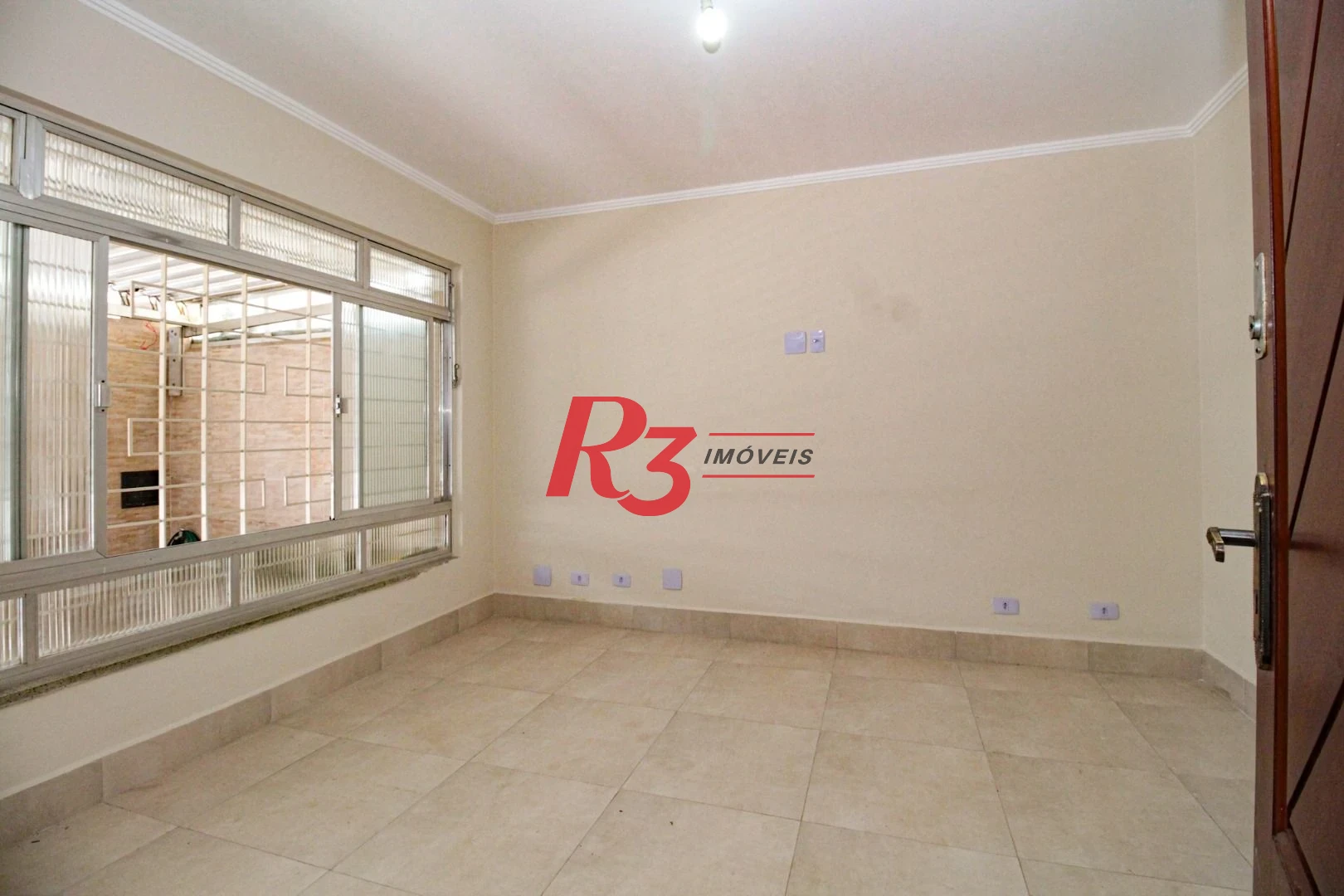 Casa com 3 dormitórios à venda, 110 m² por R$ 870.000,00 - Encruzilhada - Santos/SP