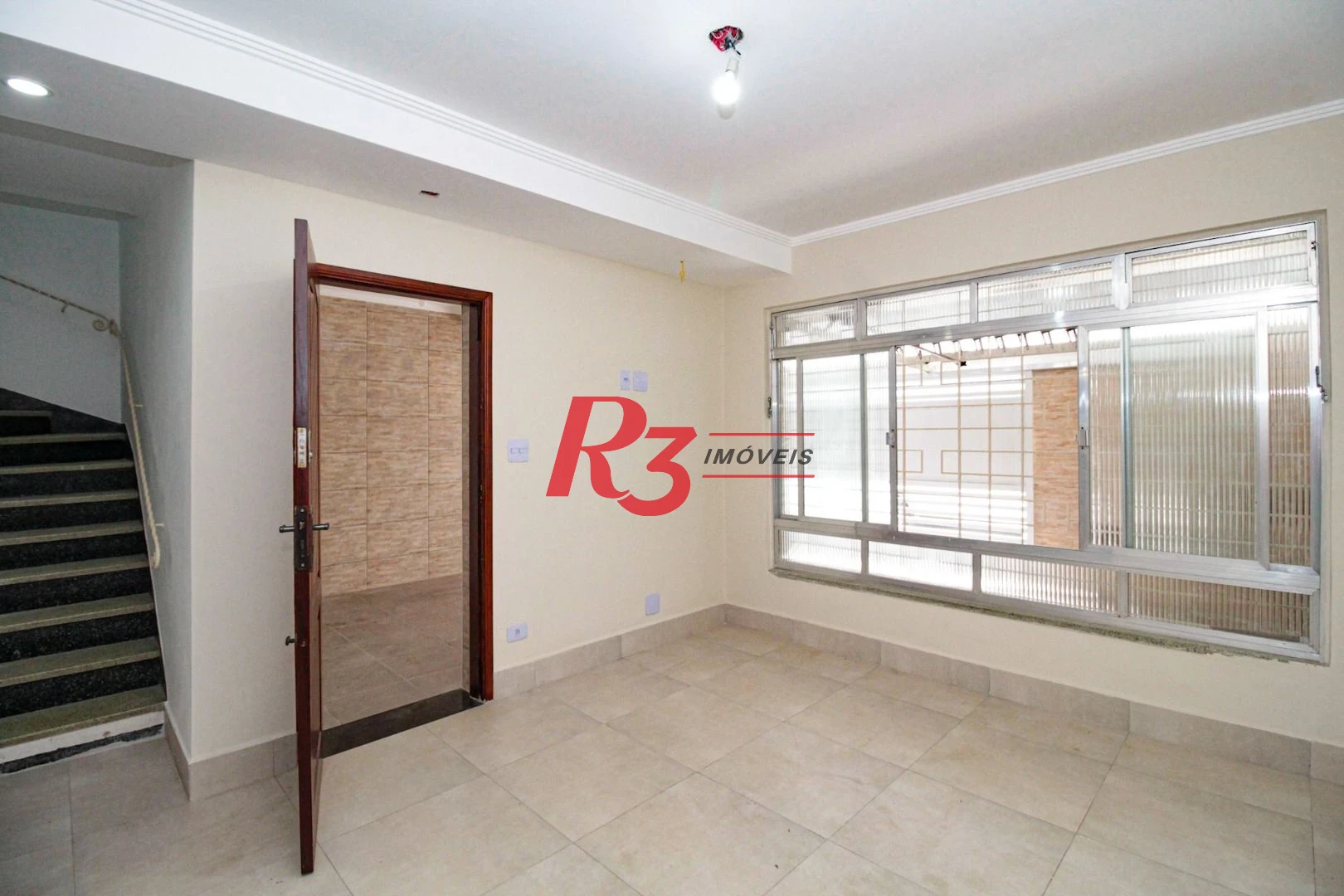 Casa com 3 dormitórios à venda, 110 m² por R$ 870.000,00 - Encruzilhada - Santos/SP