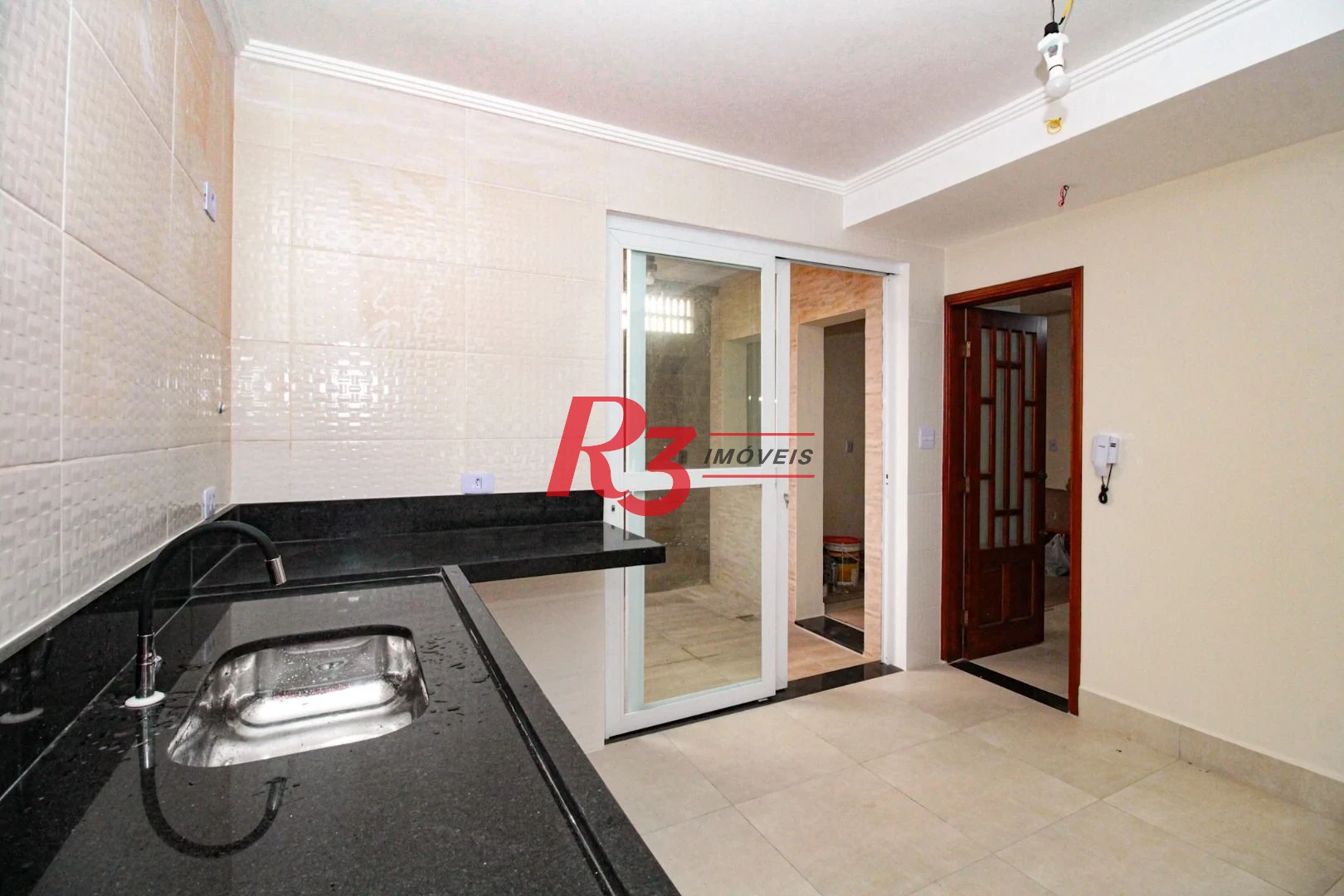 Casa com 3 dormitórios à venda, 110 m² por R$ 870.000,00 - Encruzilhada - Santos/SP