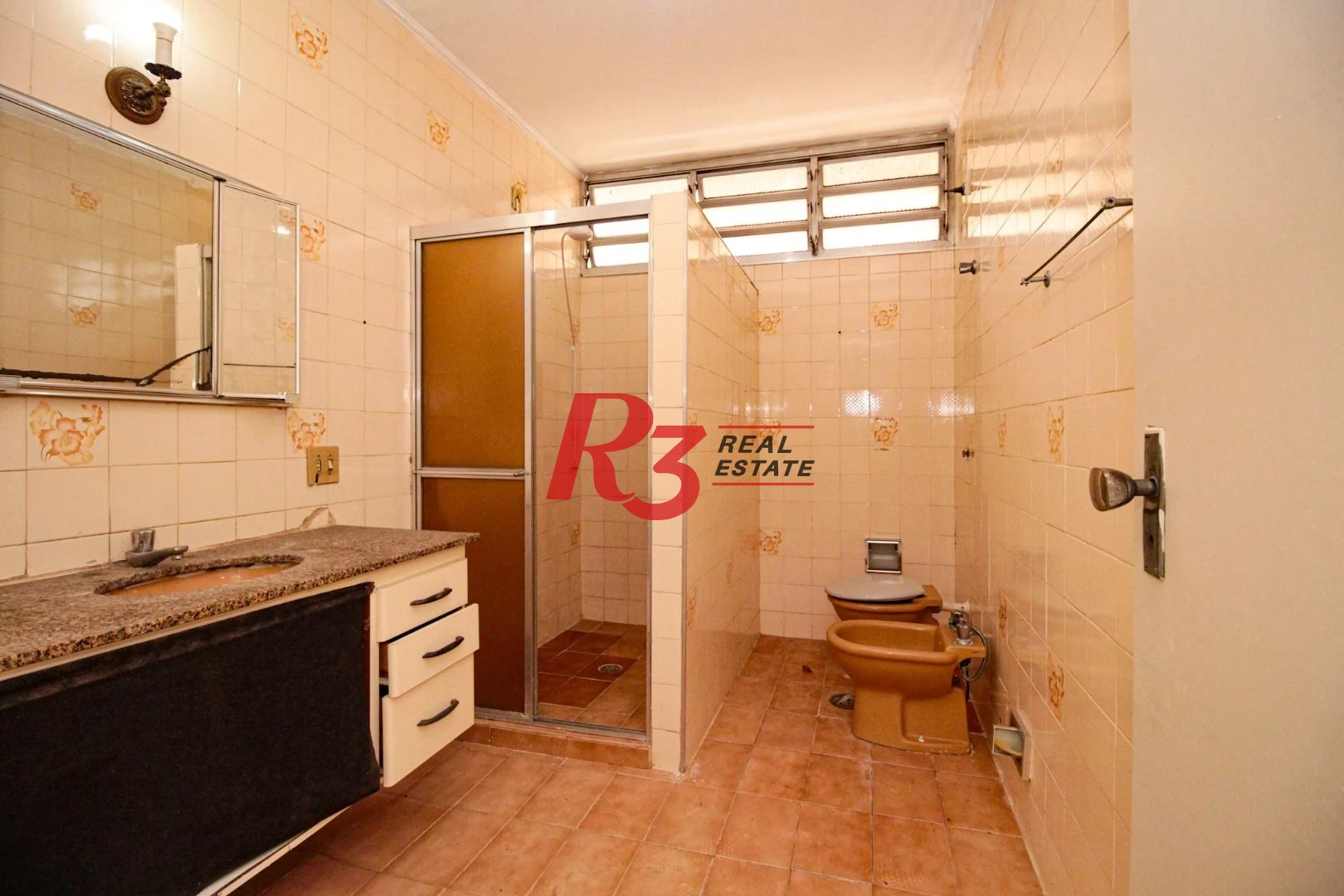 Sobrado com 3 dormitórios à venda, 164 m² por R$ 1.280.000,00 - Marapé - Santos/SP