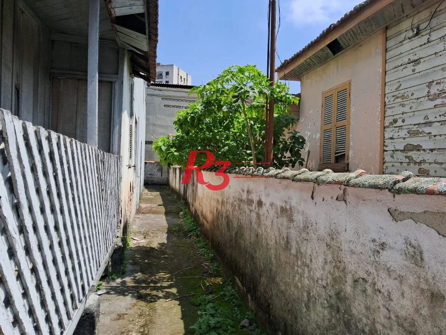 Terreno à venda, 232 m² por R$ 615.000,00 - Estuário - Santos/SP