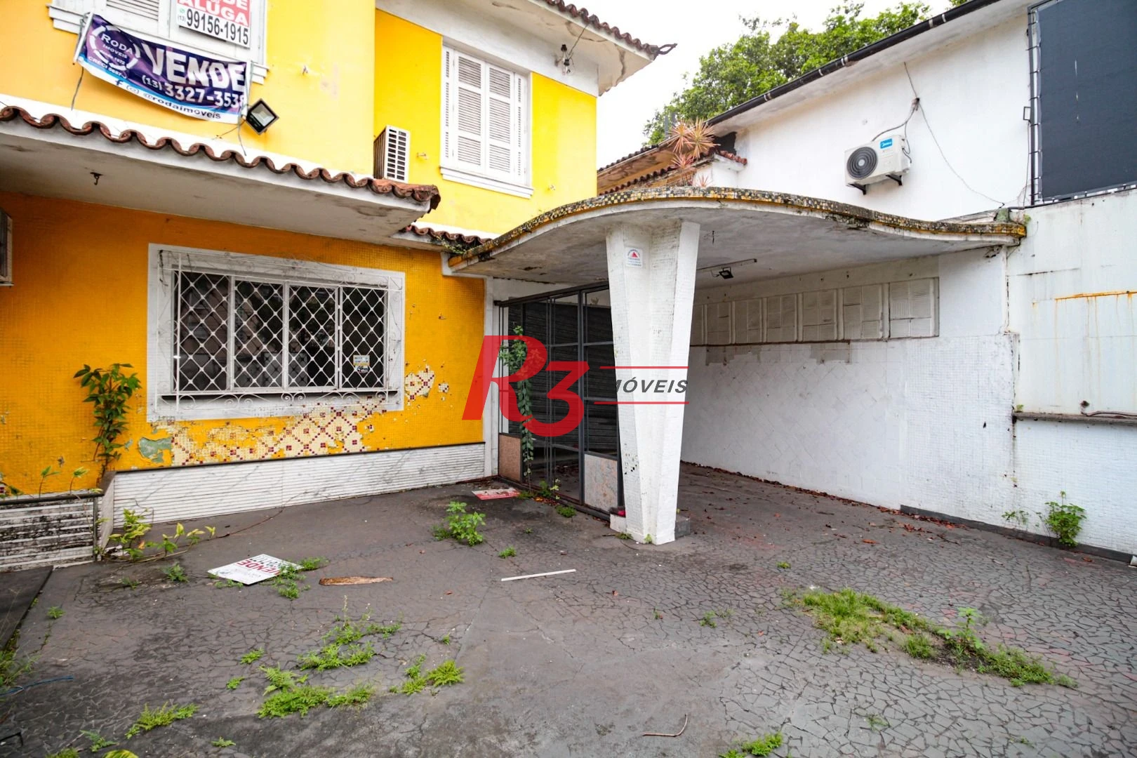 Sobrado com 3 dormitórios à venda, 300 m² por R$ 1.280.000,00 - Embaré - Santos/SP