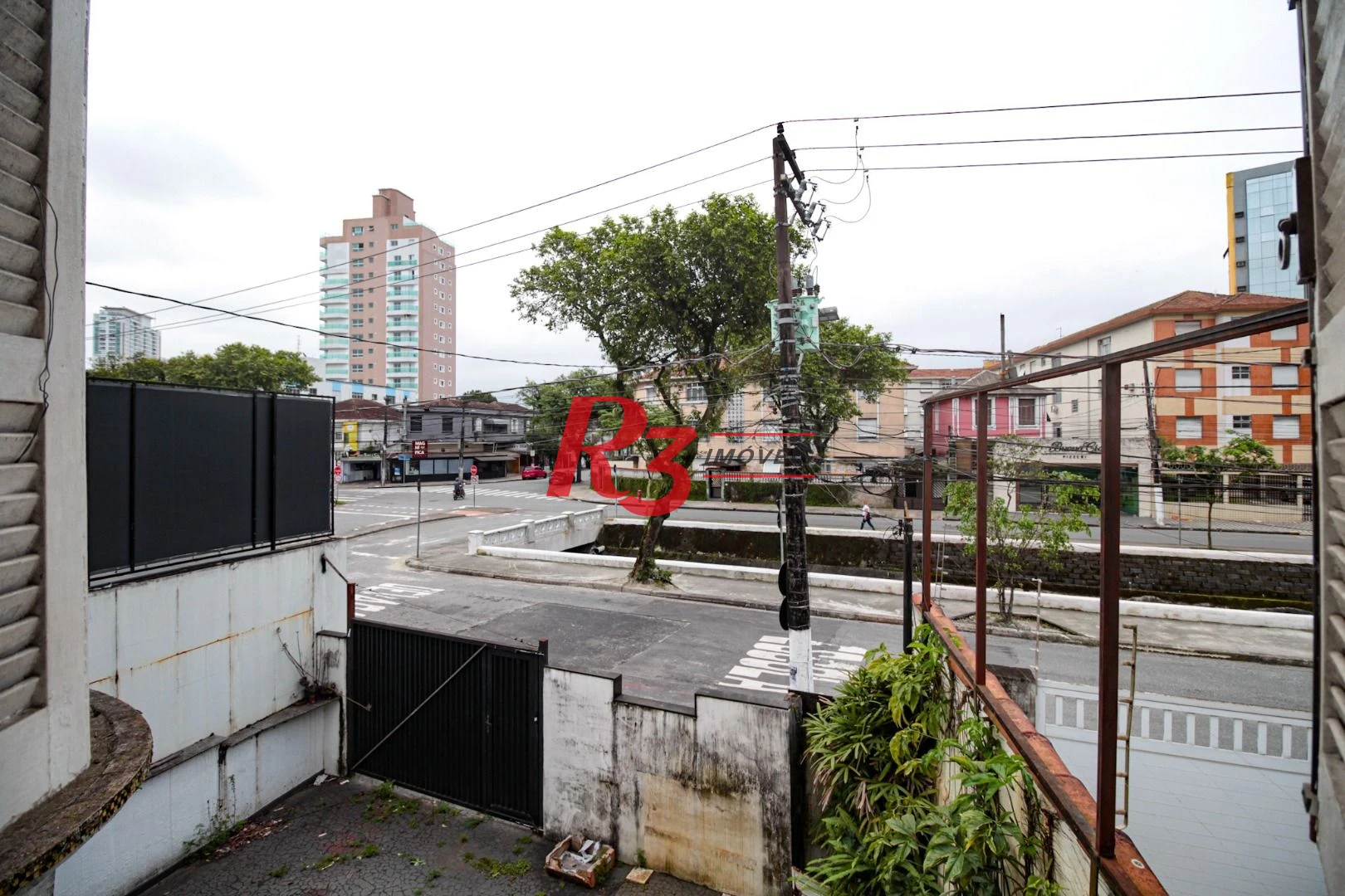 Sobrado com 3 dormitórios à venda, 300 m² por R$ 1.280.000,00 - Embaré - Santos/SP