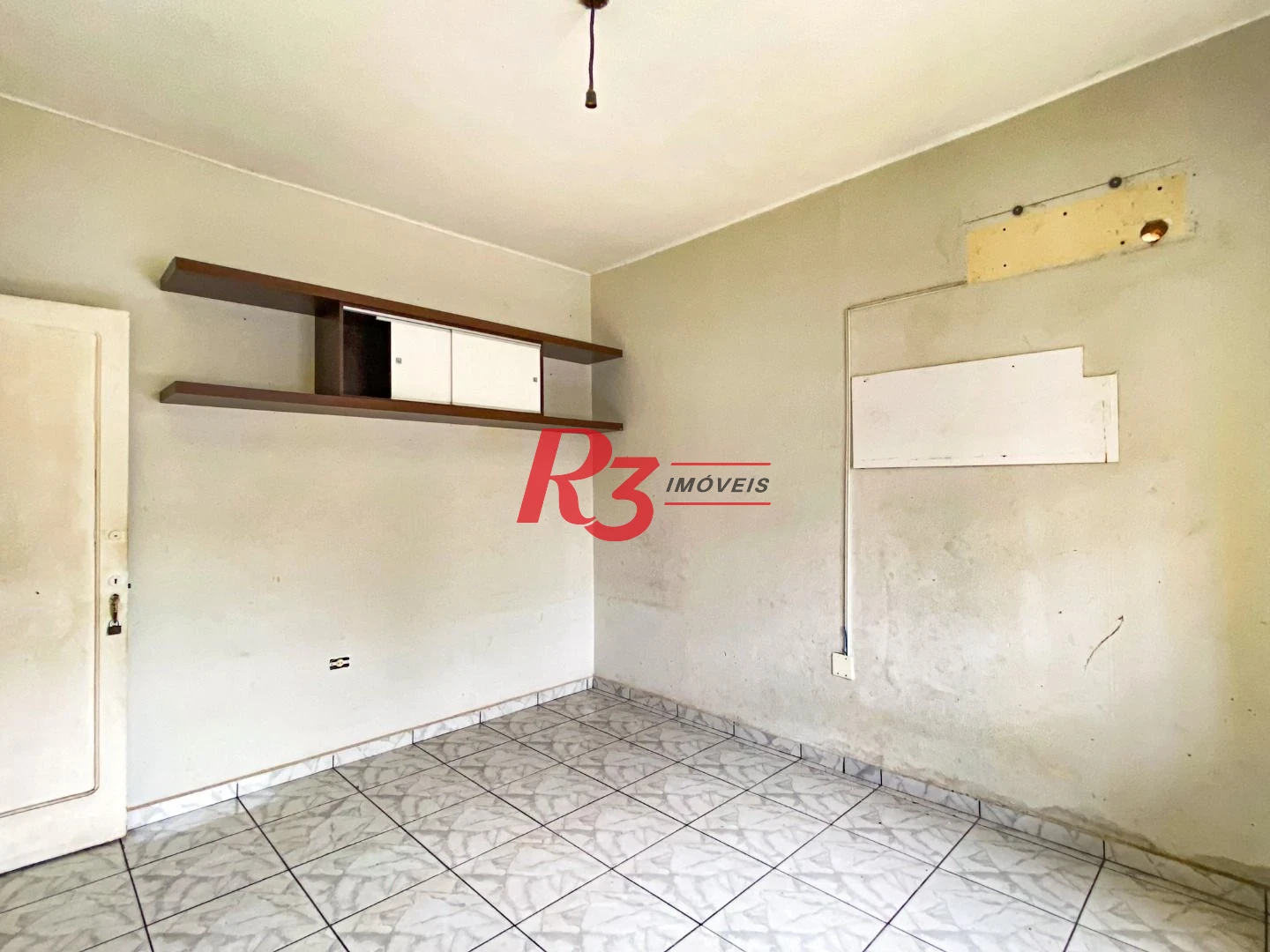 Sobrado com 3 dormitórios à venda, 300 m² por R$ 1.280.000,00 - Embaré - Santos/SP