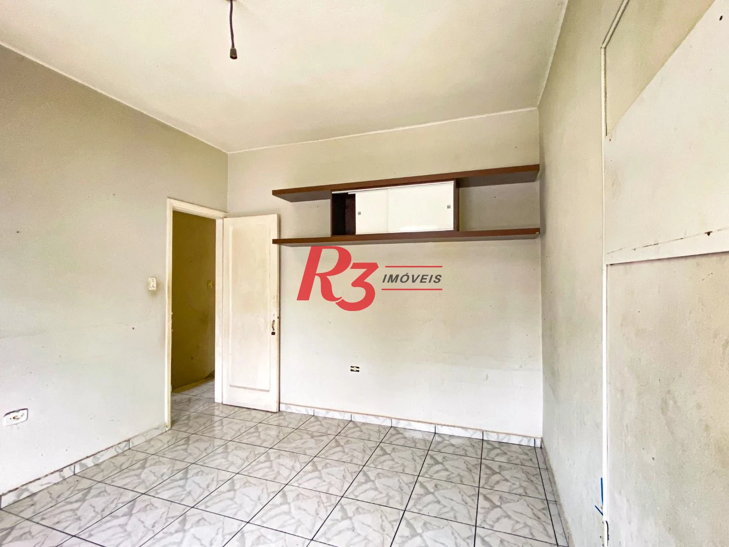 Sobrado com 3 dormitórios à venda, 300 m² por R$ 1.280.000,00 - Embaré - Santos/SP