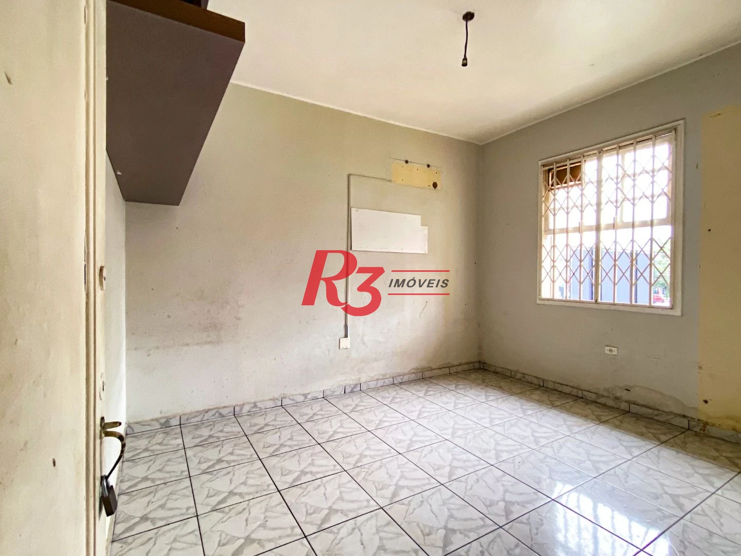 Sobrado com 3 dormitórios à venda, 300 m² por R$ 1.280.000,00 - Embaré - Santos/SP