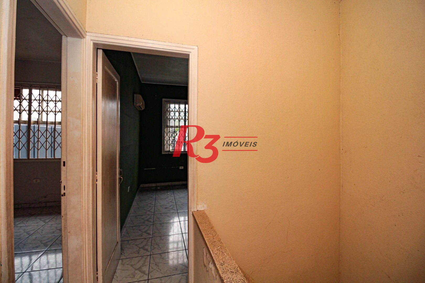 Sobrado com 3 dormitórios à venda, 300 m² por R$ 1.280.000,00 - Embaré - Santos/SP