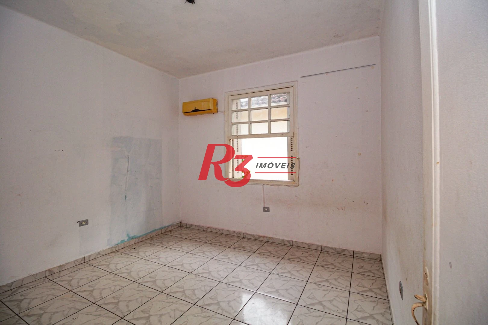 Sobrado com 3 dormitórios à venda, 300 m² por R$ 1.280.000,00 - Embaré - Santos/SP