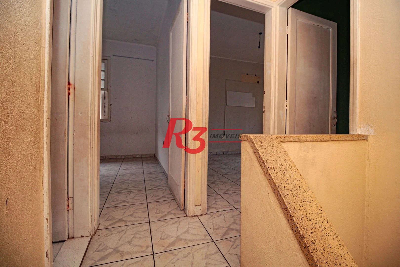 Sobrado com 3 dormitórios à venda, 300 m² por R$ 1.280.000,00 - Embaré - Santos/SP