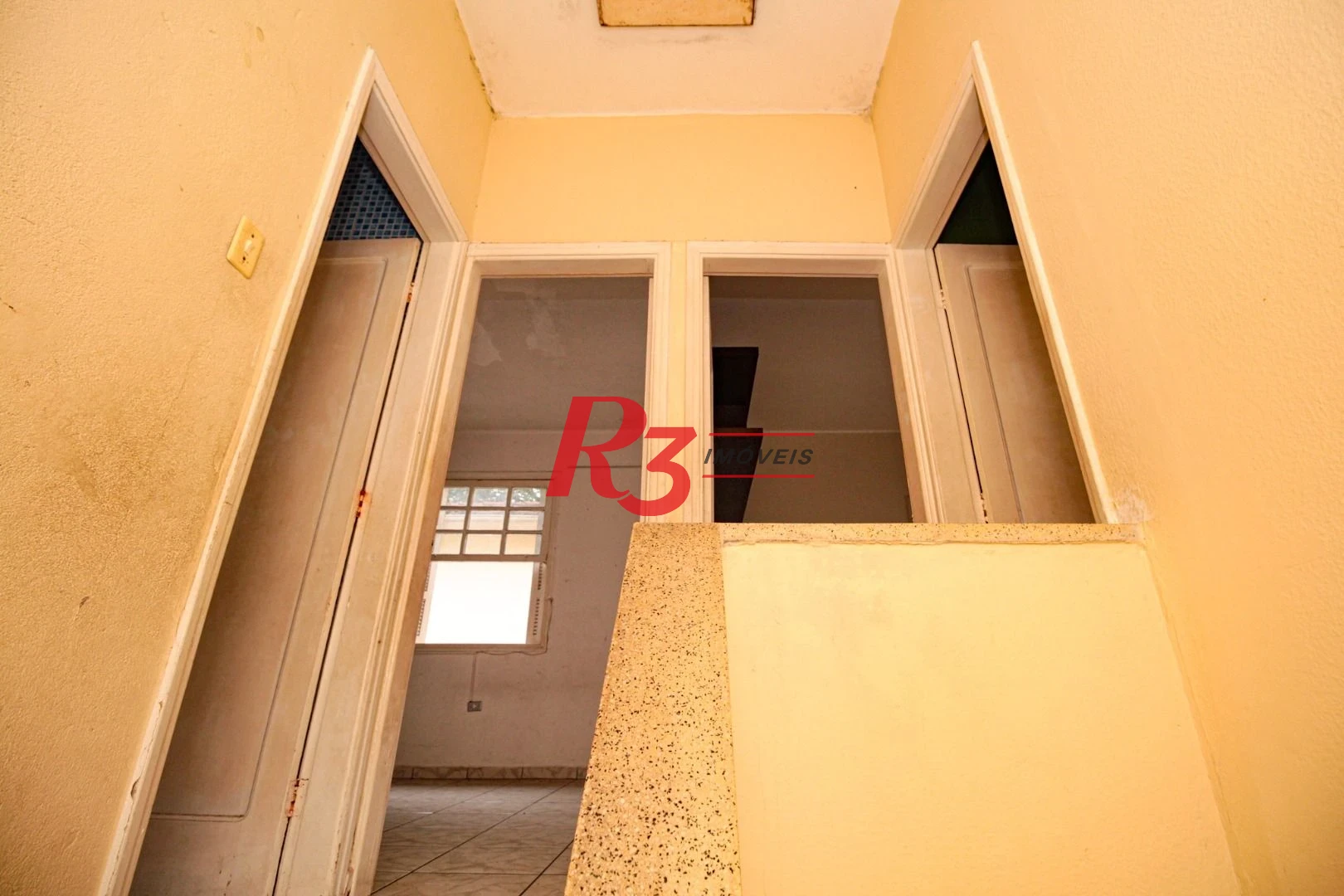 Sobrado com 3 dormitórios à venda, 300 m² por R$ 1.280.000,00 - Embaré - Santos/SP