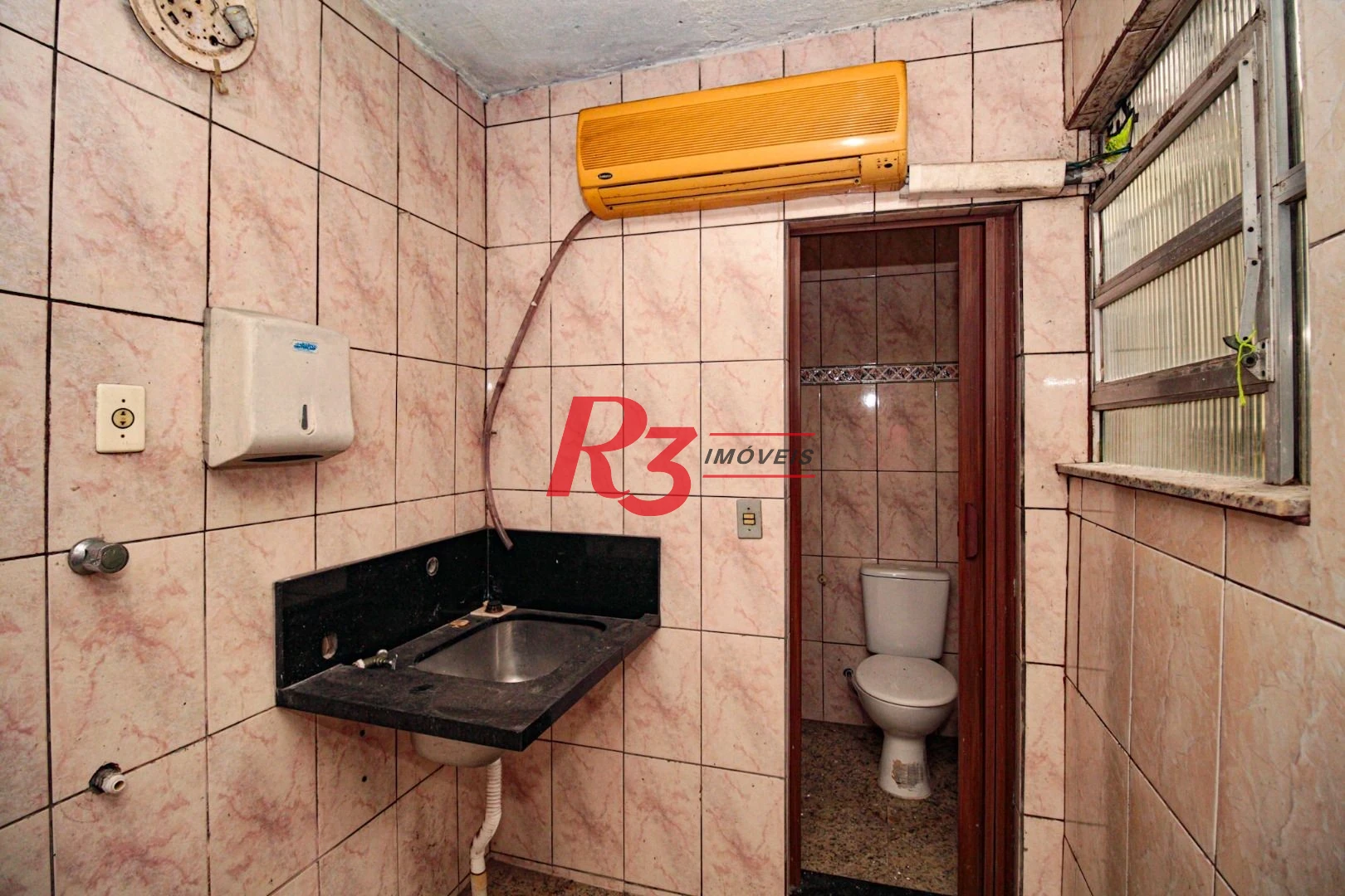 Sobrado com 3 dormitórios à venda, 300 m² por R$ 1.280.000,00 - Embaré - Santos/SP