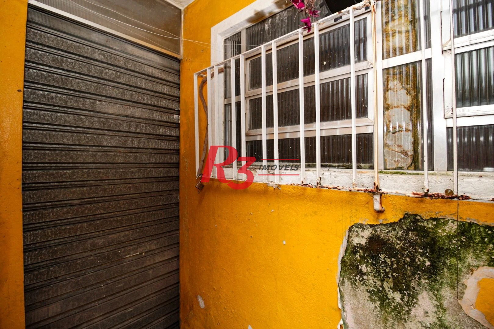 Sobrado com 3 dormitórios à venda, 300 m² por R$ 1.280.000,00 - Embaré - Santos/SP