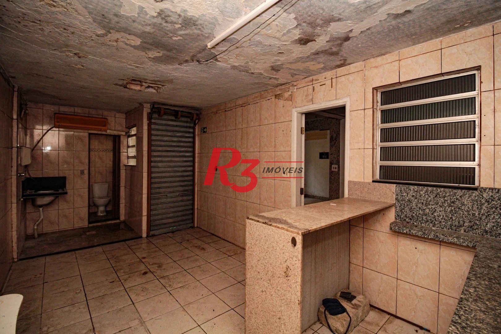 Sobrado com 3 dormitórios à venda, 300 m² por R$ 1.280.000,00 - Embaré - Santos/SP