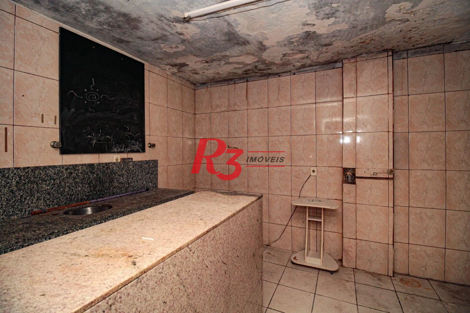 Sobrado com 3 dormitórios à venda, 300 m² por R$ 1.280.000,00 - Embaré - Santos/SP