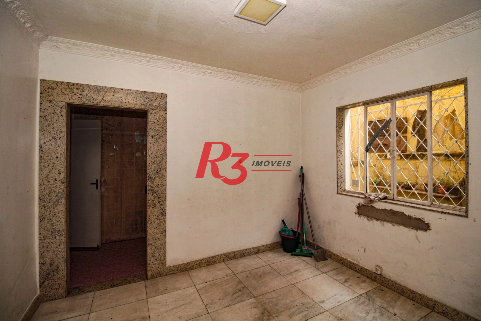 Sobrado com 3 dormitórios à venda, 300 m² por R$ 1.280.000,00 - Embaré - Santos/SP