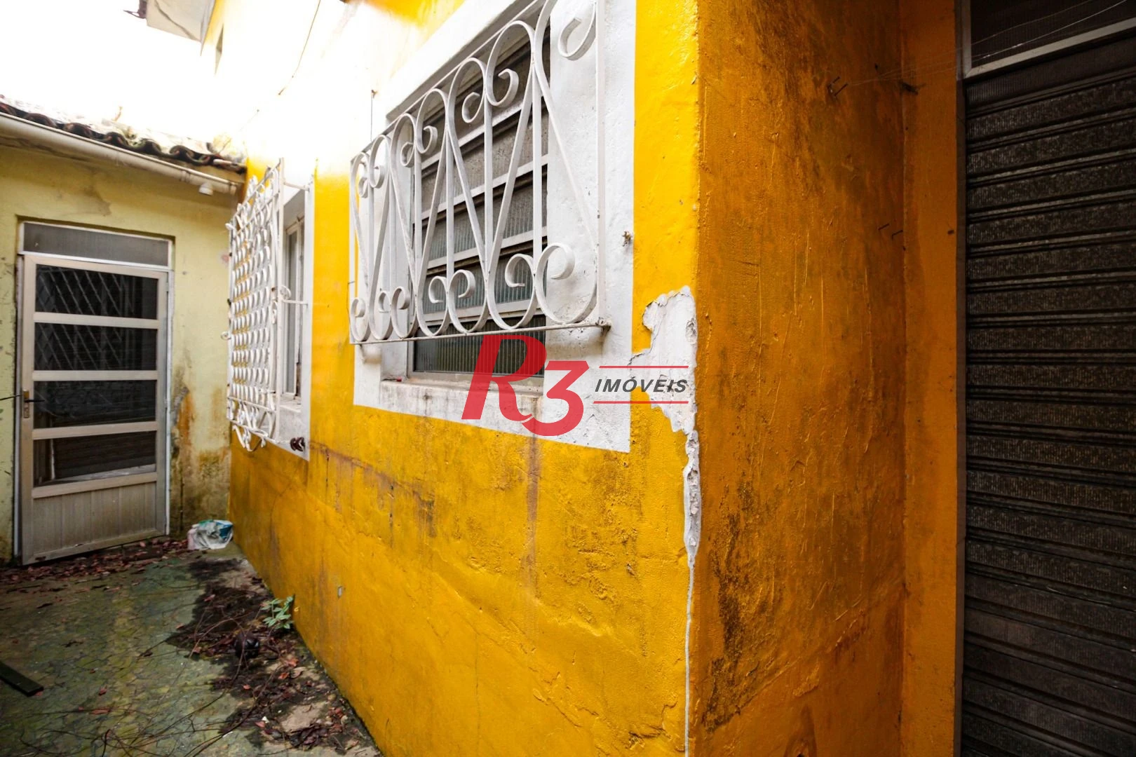 Sobrado com 3 dormitórios à venda, 300 m² por R$ 1.280.000,00 - Embaré - Santos/SP