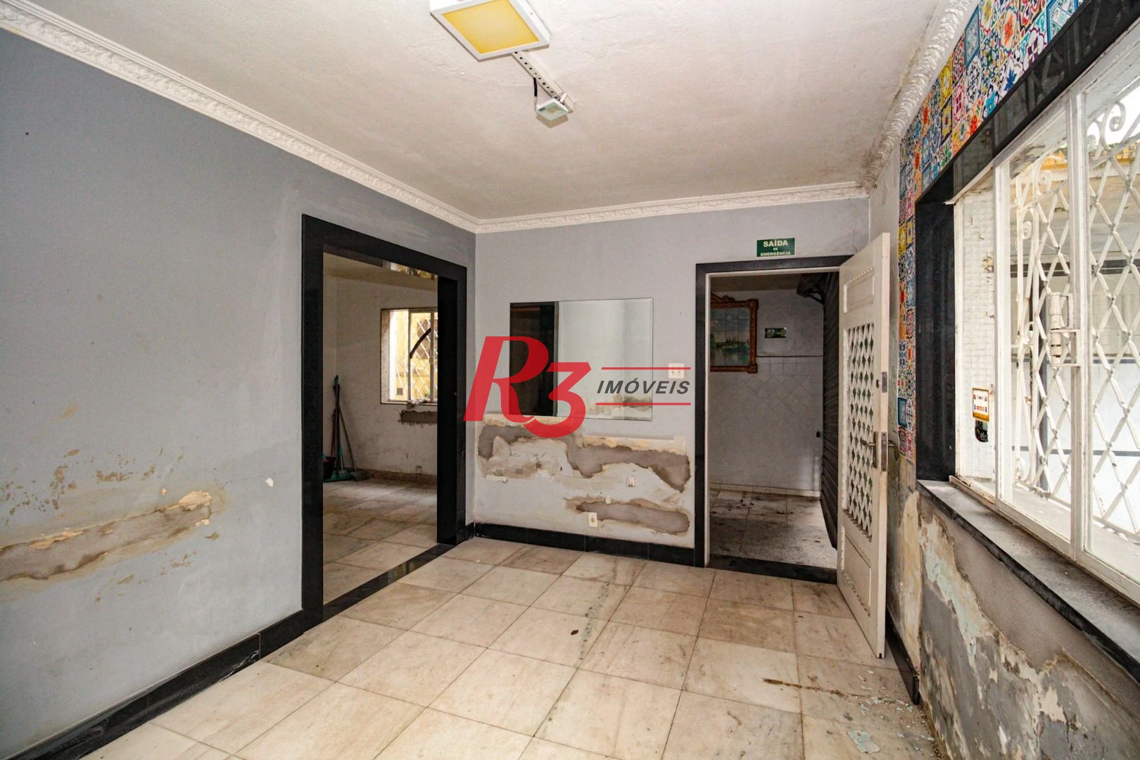 Sobrado com 3 dormitórios à venda, 300 m² por R$ 1.280.000,00 - Embaré - Santos/SP