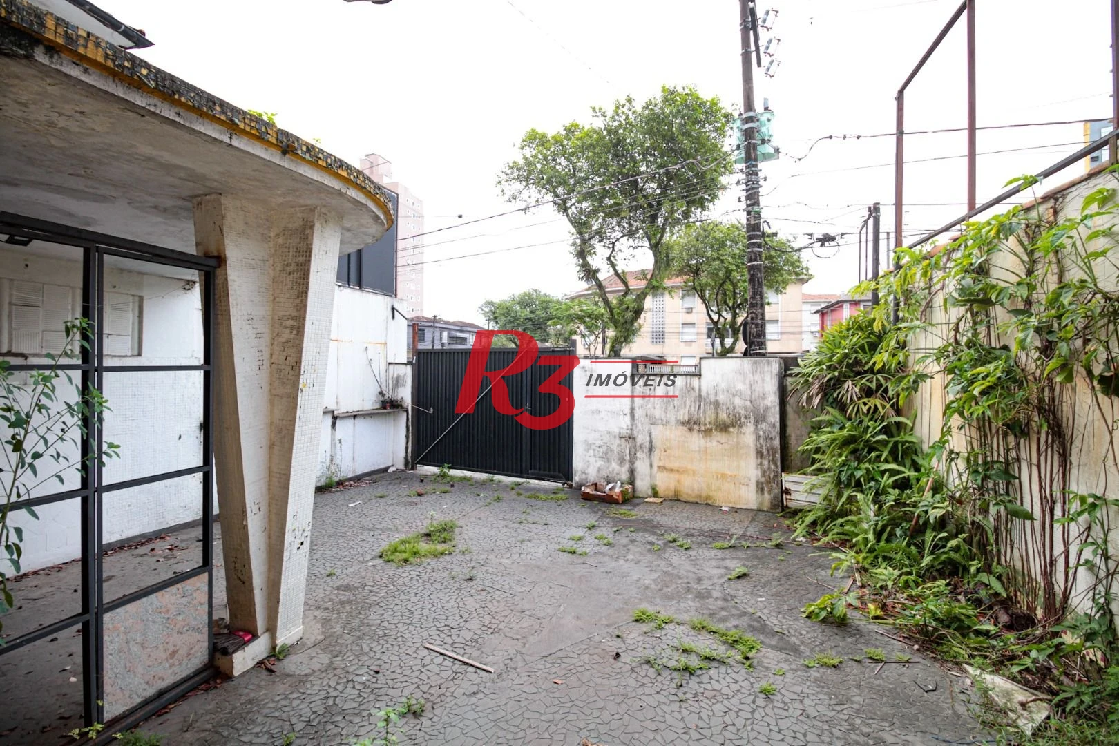Sobrado com 3 dormitórios à venda, 300 m² por R$ 1.280.000,00 - Embaré - Santos/SP