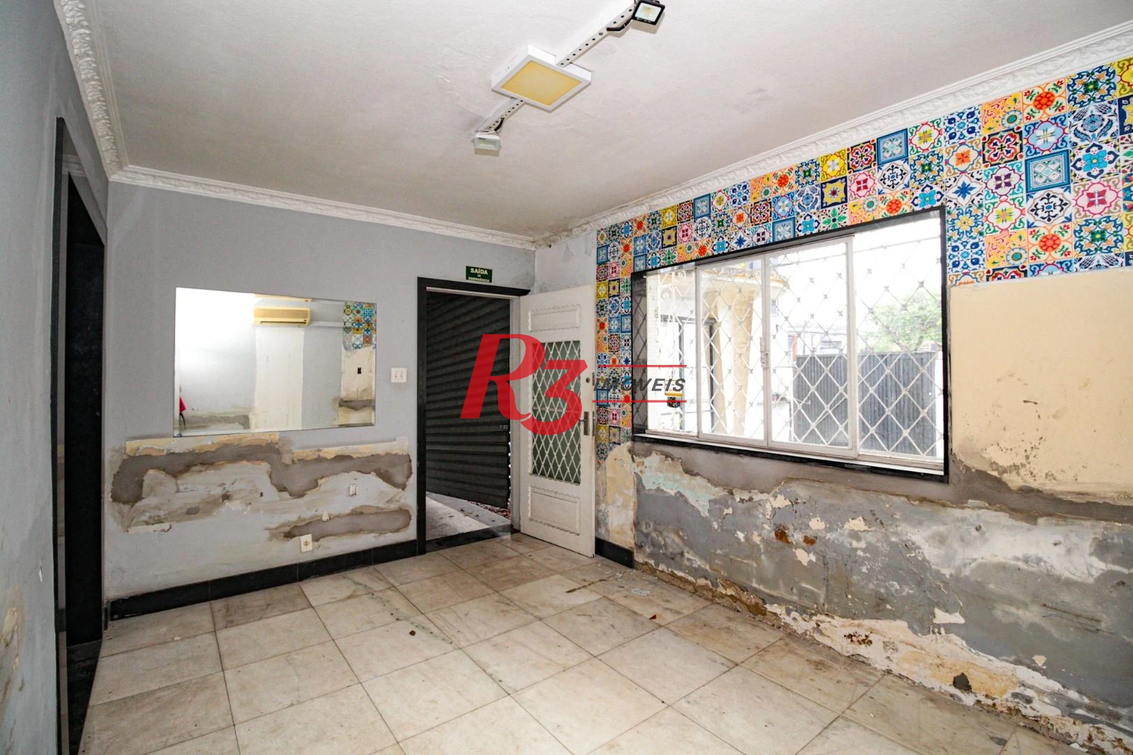Sobrado com 3 dormitórios à venda, 300 m² por R$ 1.280.000,00 - Embaré - Santos/SP