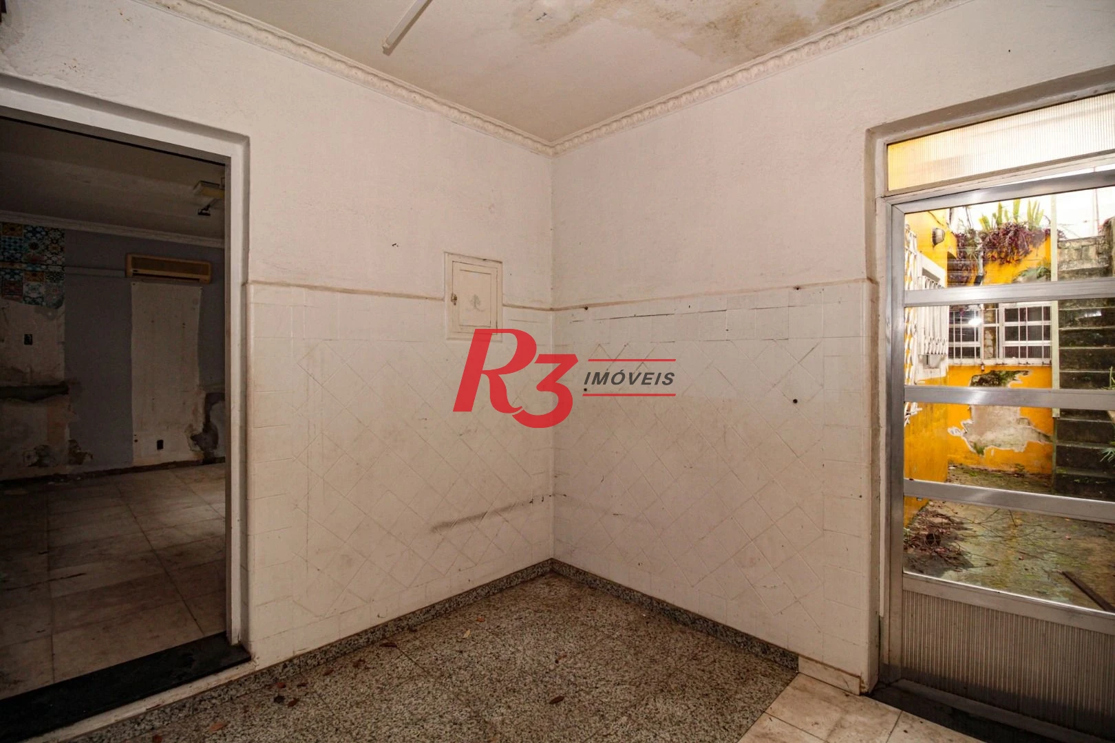 Sobrado com 3 dormitórios à venda, 300 m² por R$ 1.280.000,00 - Embaré - Santos/SP