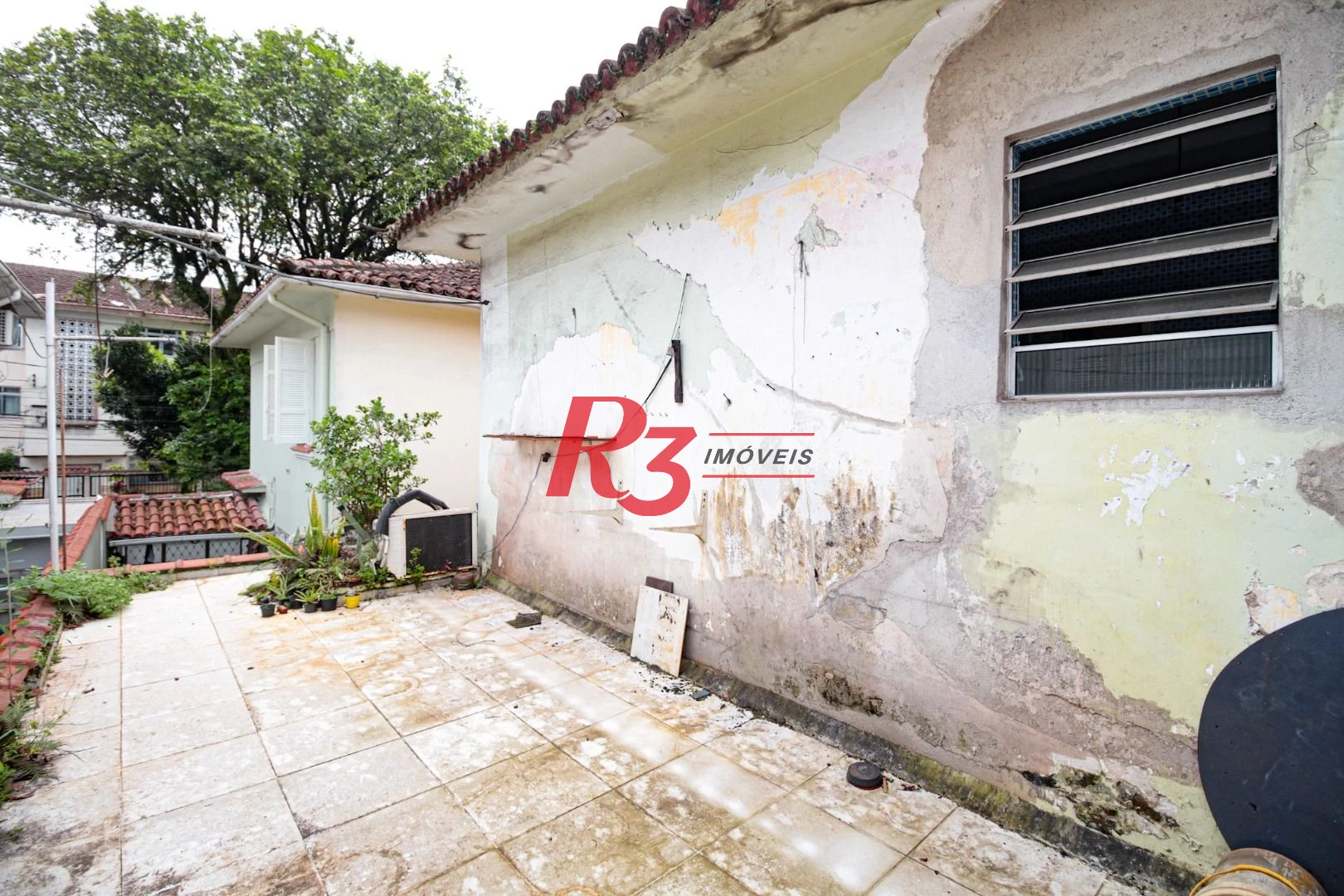 Sobrado com 3 dormitórios à venda, 300 m² por R$ 1.280.000,00 - Embaré - Santos/SP