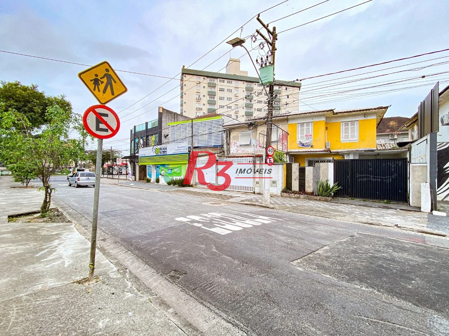 Sobrado com 3 dormitórios à venda, 300 m² por R$ 1.280.000,00 - Embaré - Santos/SP