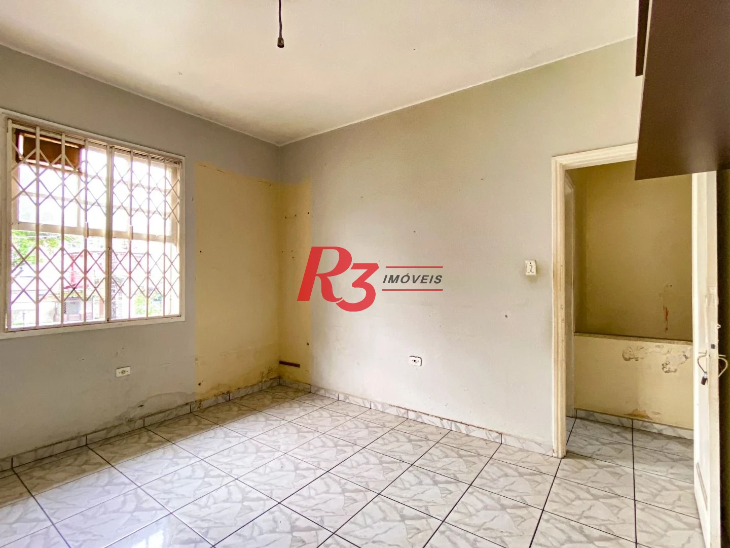 Sobrado com 3 dormitórios à venda, 300 m² por R$ 1.280.000,00 - Embaré - Santos/SP