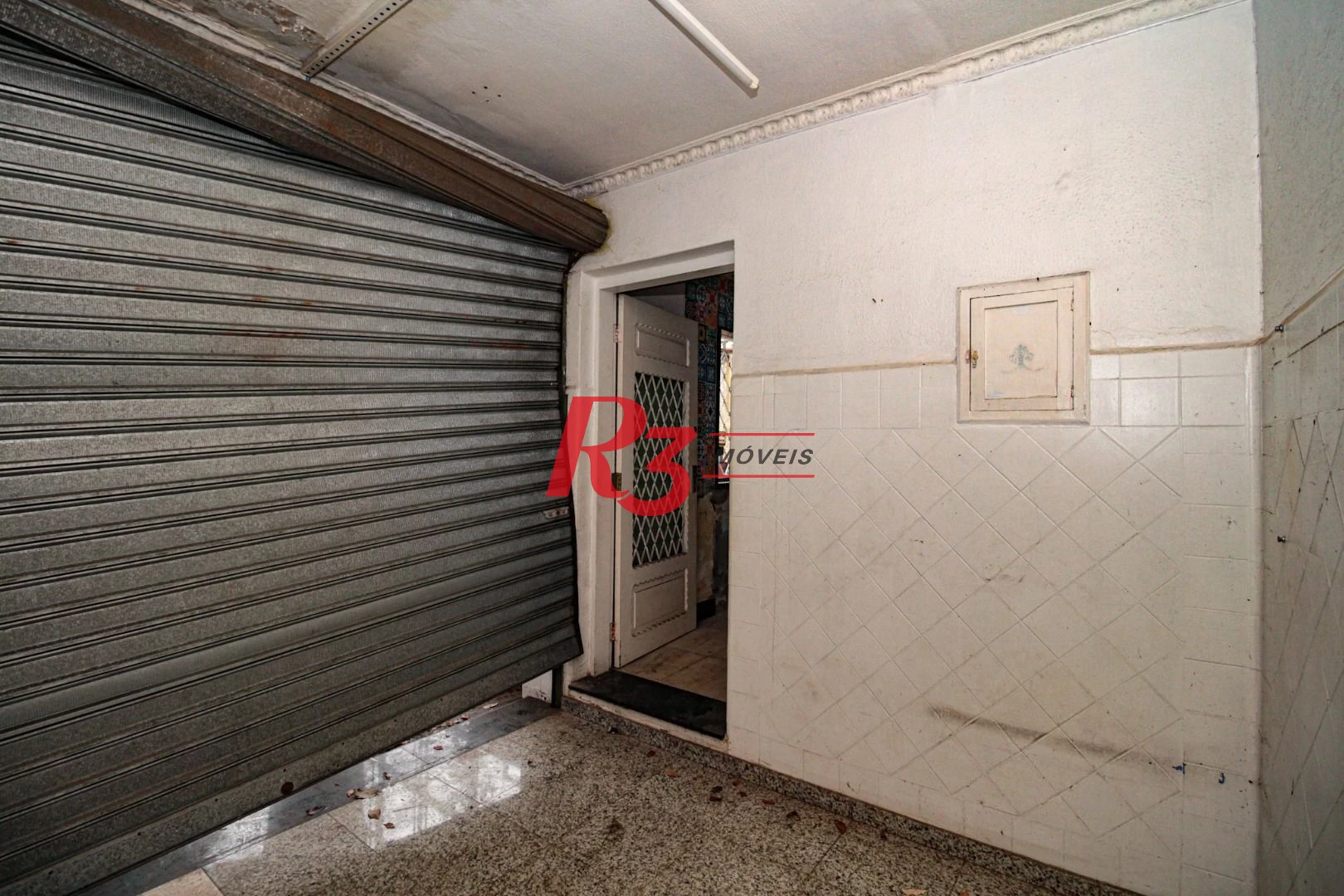 Sobrado com 3 dormitórios à venda, 300 m² por R$ 1.280.000,00 - Embaré - Santos/SP