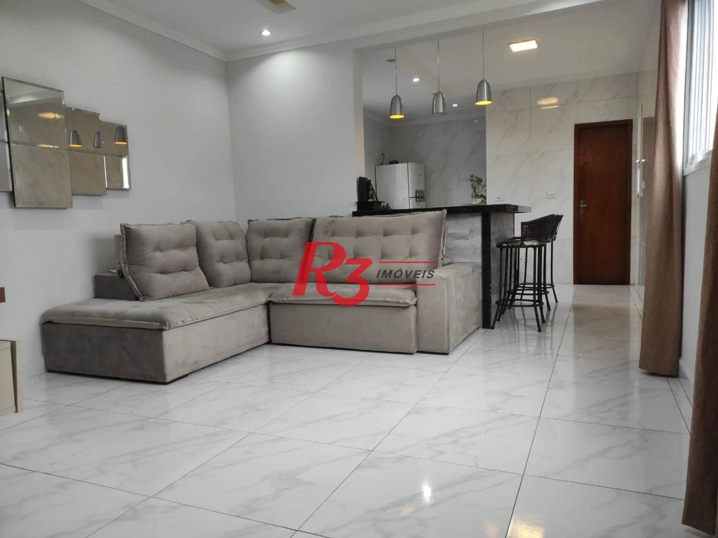 Casa à venda, 145 m² por R$ 560.000,00 - Vila Voturuá - São Vicente/SP